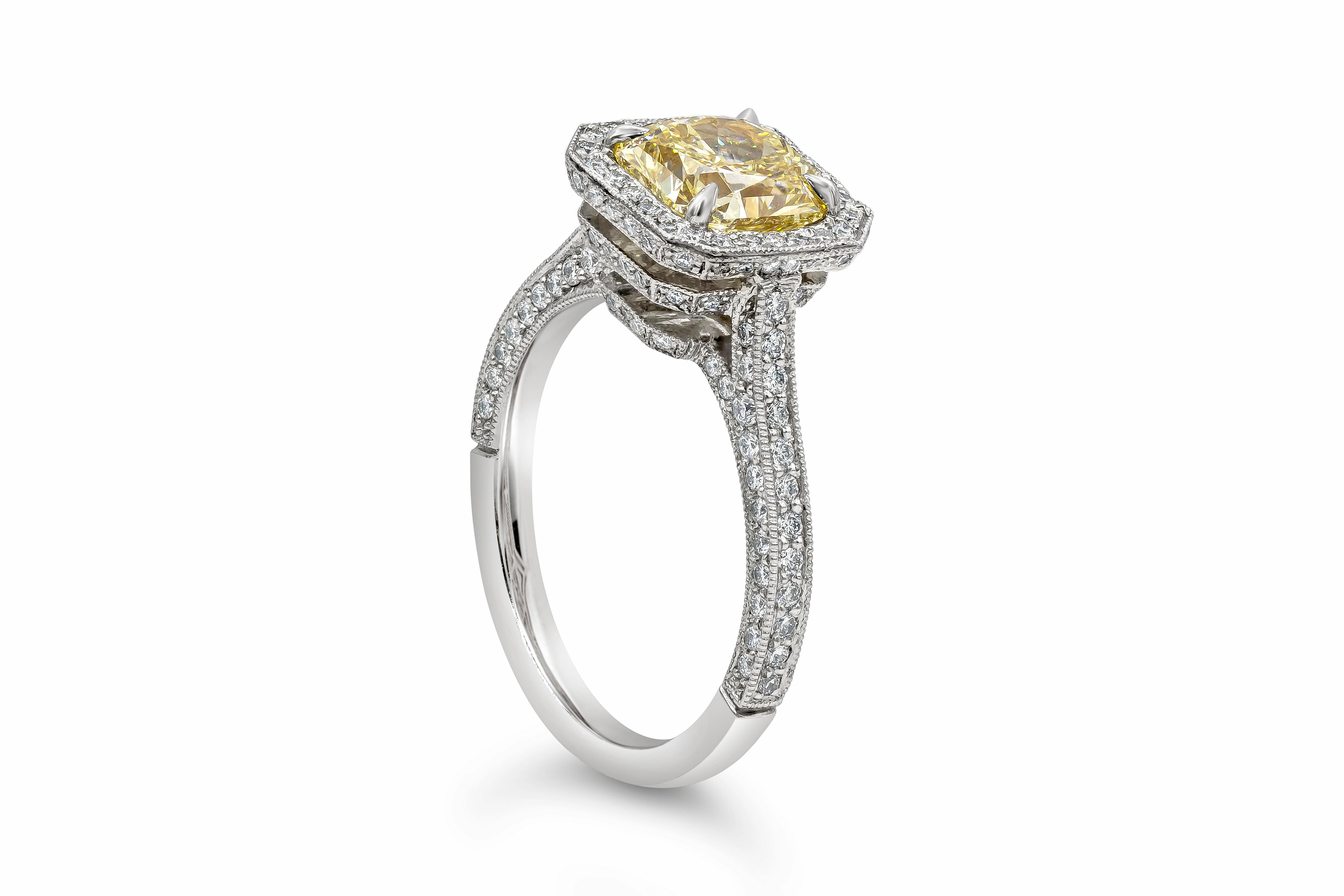 A vintage-style engagement ring showcasing a 1.76 carat radiant cut yellow diamond certified by GIA as Fancy Brownish Yellow color, VS1 clarity, set in a brilliant diamond four prong bezel set halo style. Polished platinum mounting accented with