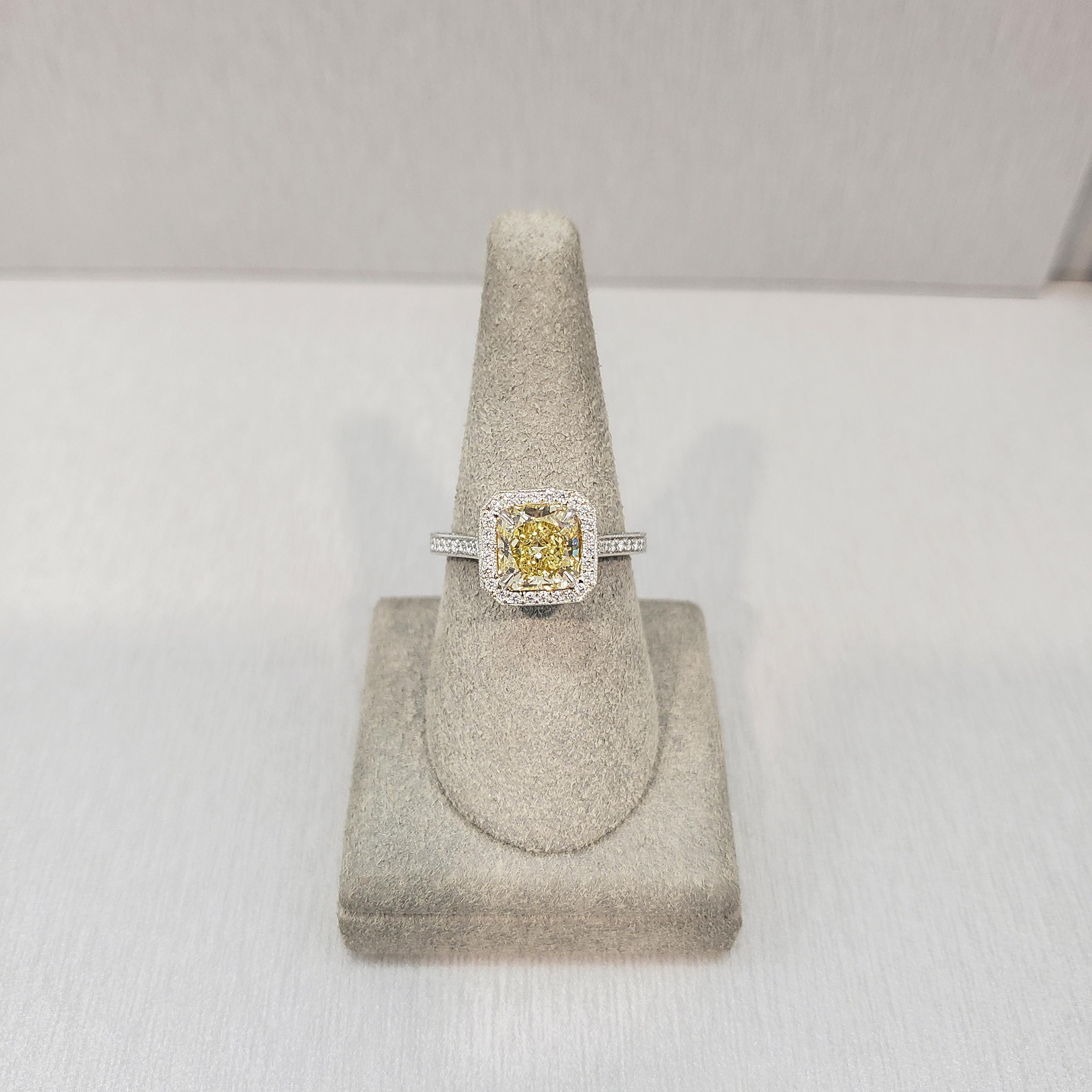 Contemporary GIA Certified 1.76 Carats Yellow Diamond Vintage Style Halo Engagement Ring For Sale