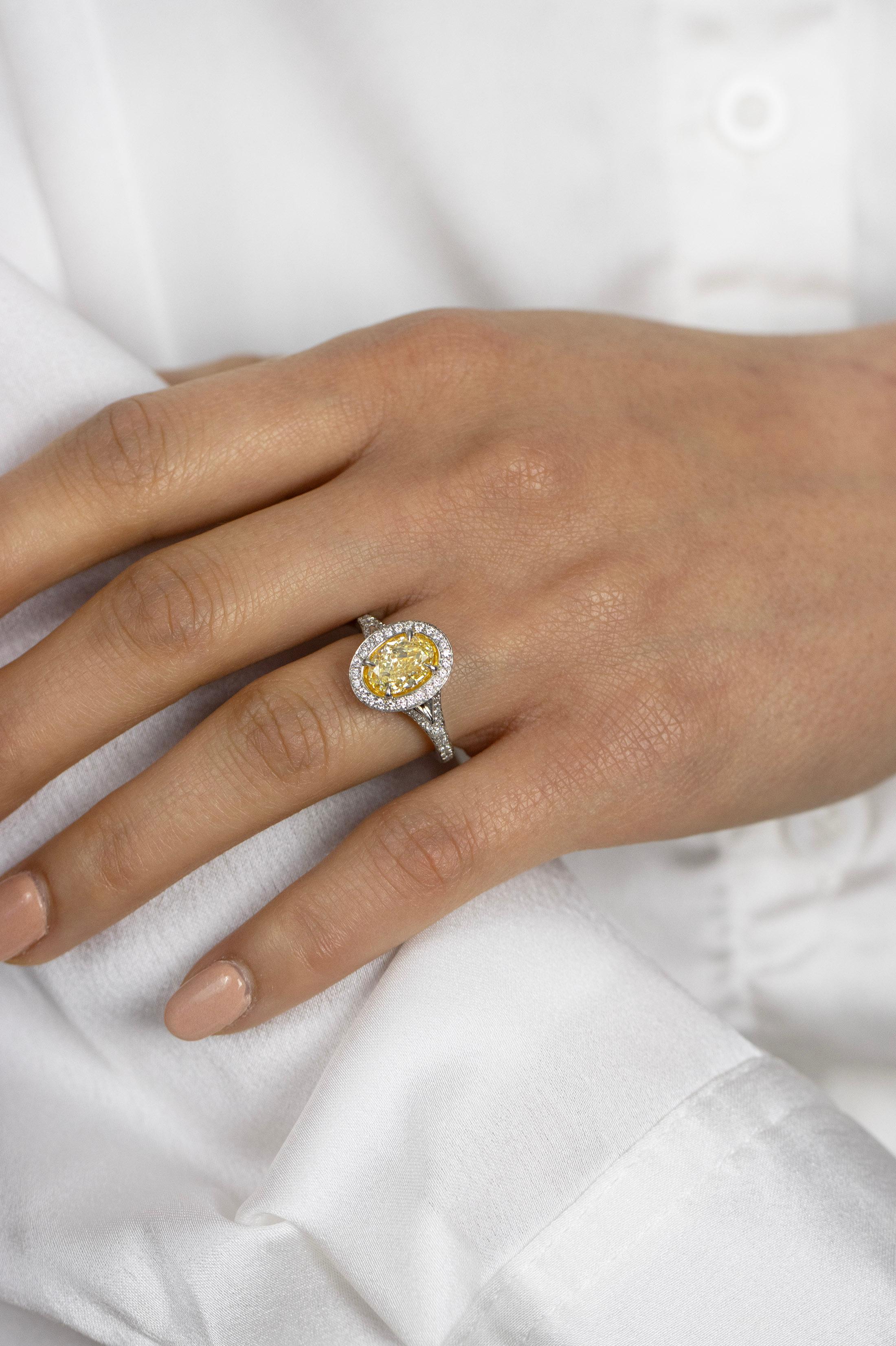 GIA Certified 1.76 Carats Oval Cut Yellow Diamond Halo Engagement Ring In New Condition For Sale In New York, NY