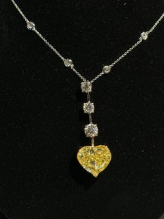 GIA Certified 17.70 Carat Natural Fancy Yellow Heart and White Diamond  Necklace