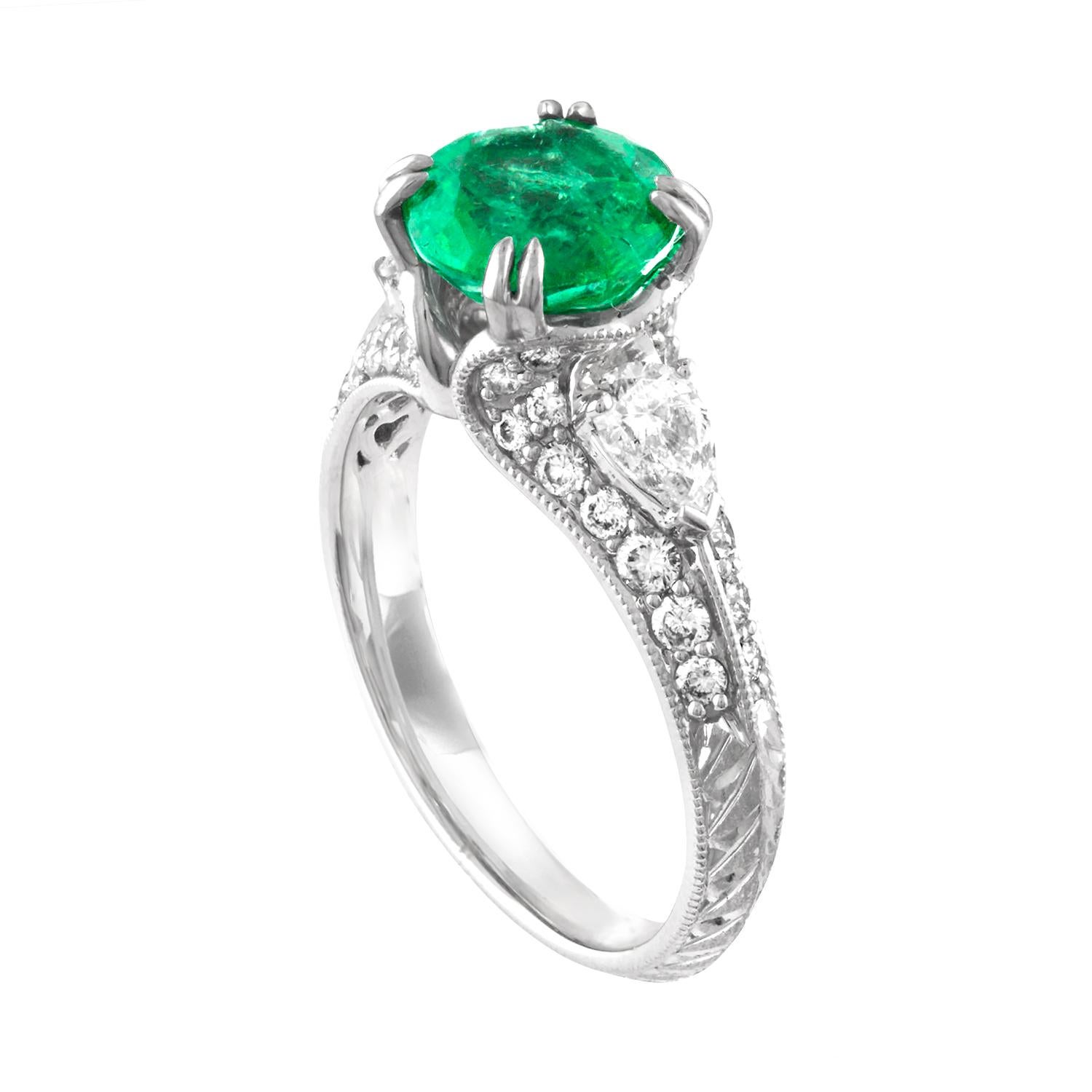 Beautifully Milgrain and Diamond Cut Filigree Emerald Ring
The ring is 18K White Gold
The Center Stone is 1.78 Carats Round Emerald
The Emerald is Zambian GIA Certified Oil Treated
There are 0.90 Carats In Diamonds F/G VS/SI
The ring is a size 7,