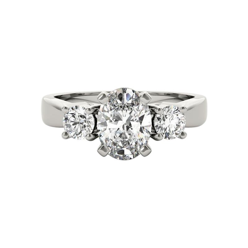 Anillo de diamantes ovalados y redondos de tres piedras de oro blanco de 18 quilates con certificado GIA de 1,79 quilates en venta