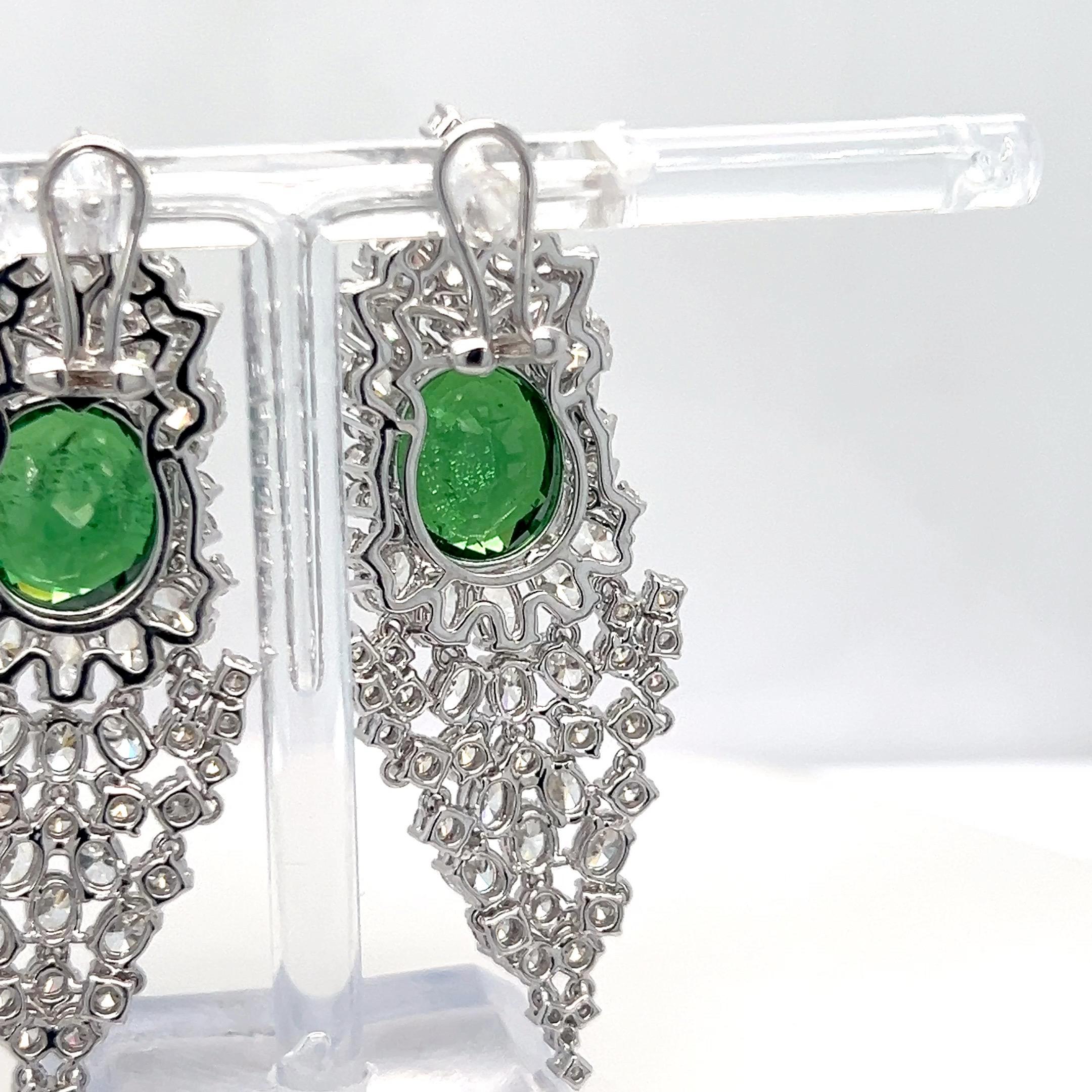 Women's GIA Certified 17.97 Carat Oval Cut Tsavorite Garnet Diamond Dangling Earrings For Sale