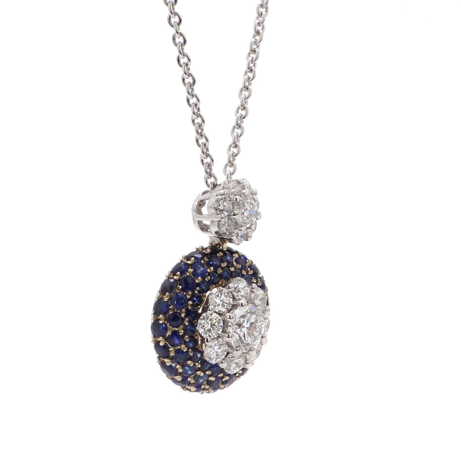 A Beautiful Handcrafted Necklace in 18 karat White Gold with Natural Brilliant Cut Colorless GIA Certified Round Diamond And AAA Cut Round Blue Sapphire Gemstones. A Statement piece for Daily Wear totaling 0.98 ct of Diamonds & 0.01 Carat of Natural