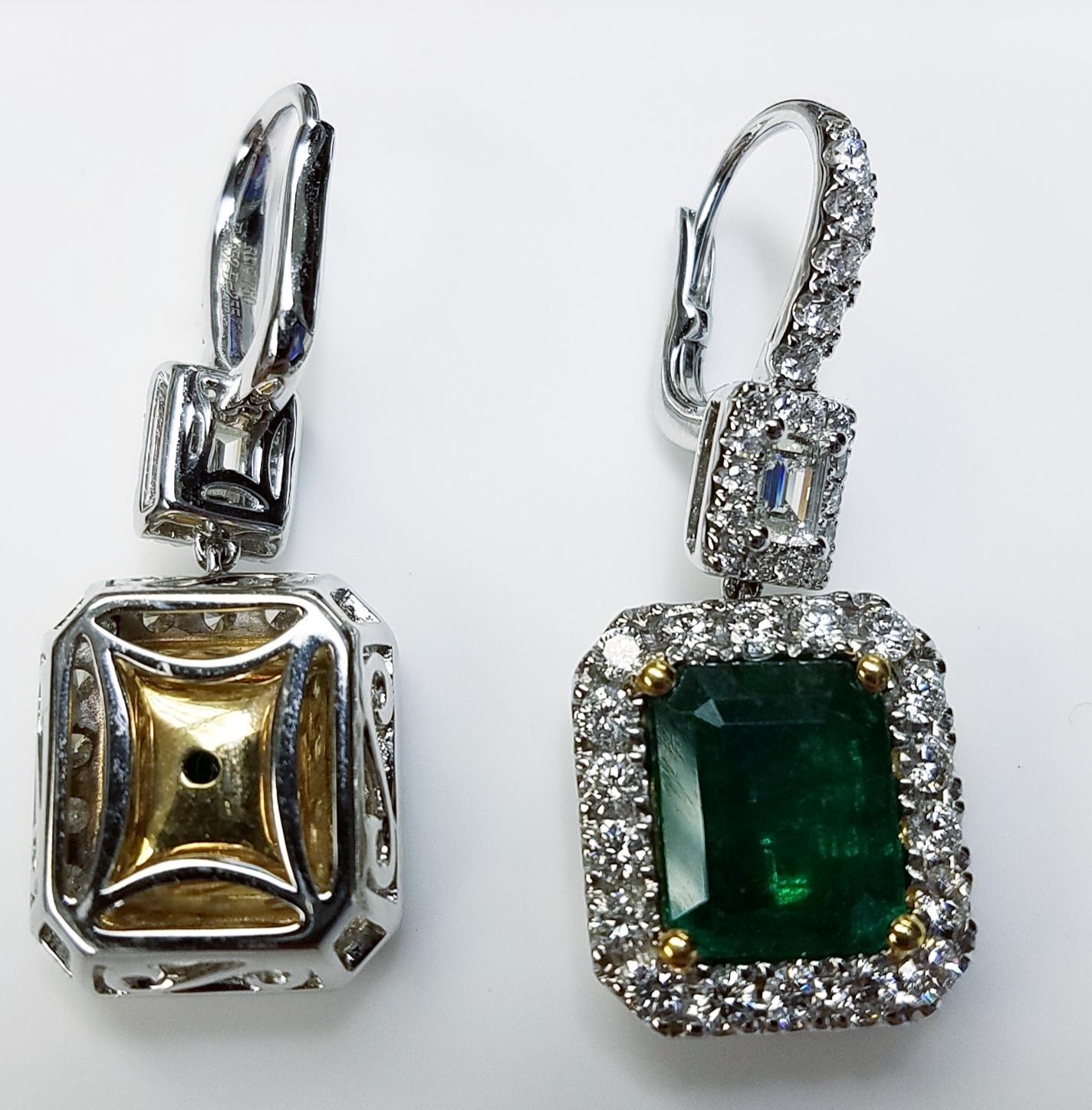 GIA Certified 18 Karat White Gold Emerald Cut Emerald and Diamond Earrings
9.52 Carats of Emeralds
2.54 Carats of Diamonds
Emerald Cut
18 Karat White Gold 
GIA Certified
