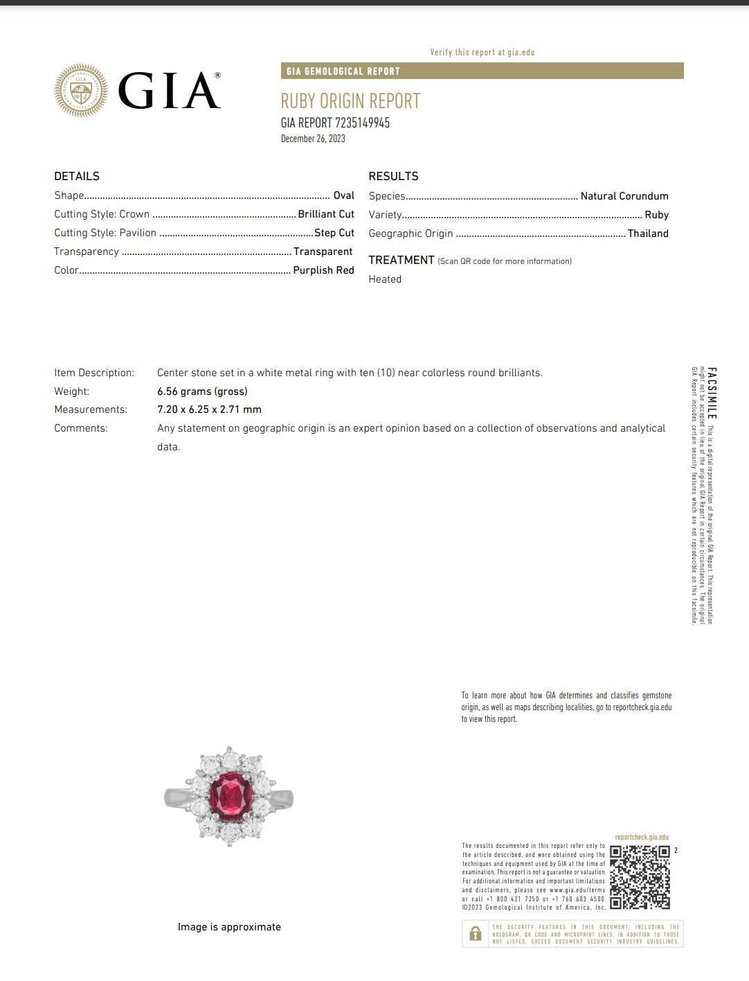 GIA Certified 18 Karat White Gold Natural Ruby & Diamond Halo Cocktail Ring 

GIA report number: 7235149945
Metal: 18k white gold
Weight: 6.56 grams
Diamonds: Approx. 1.00 carat natural round diamonds F-G VS 
Ruby: Approx. 1.00 carat natural ruby
