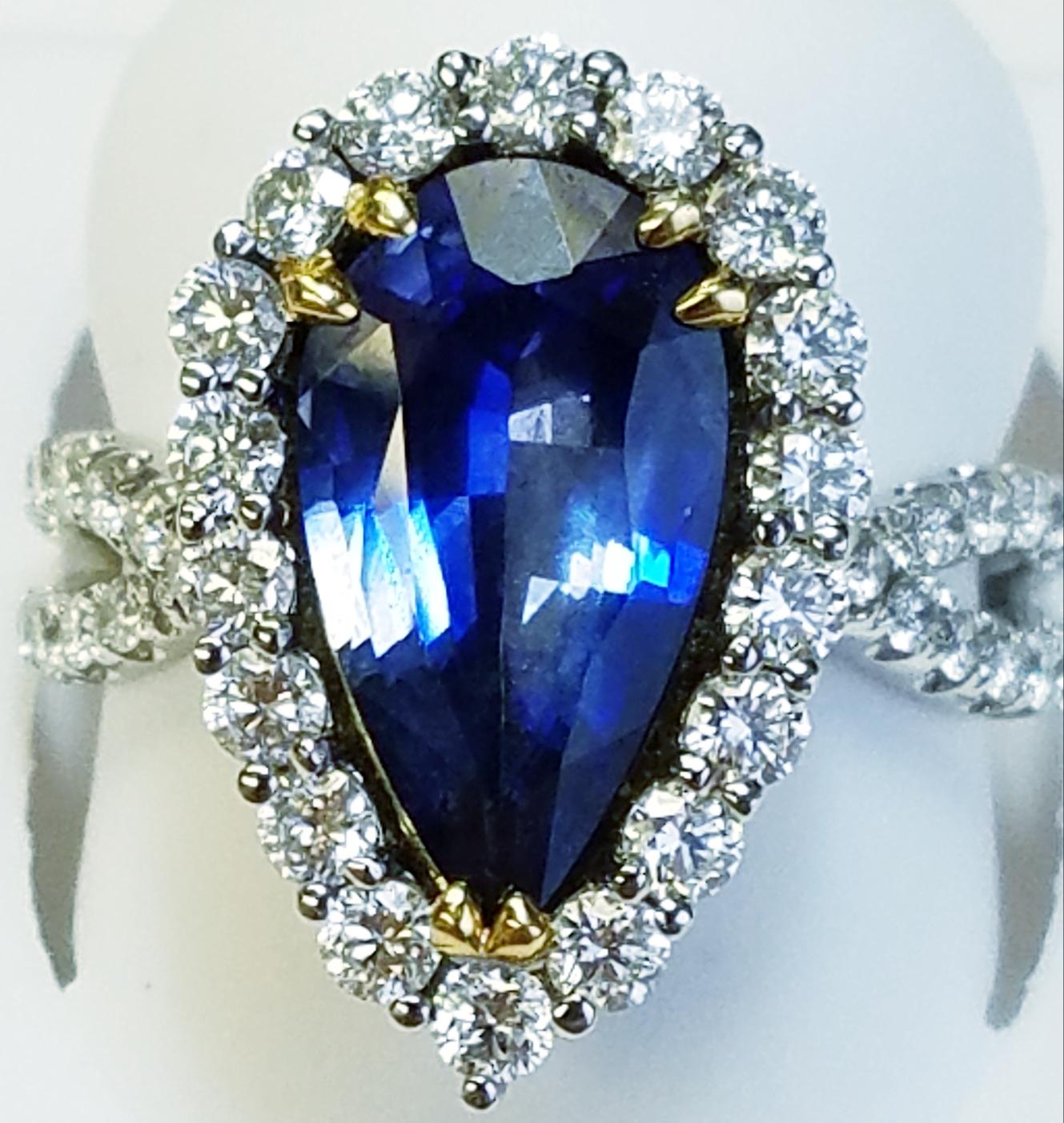 Contemporary GIA Certified 18 Karat White Gold Pear Cut Blue Sapphire and Diamond Ring For Sale