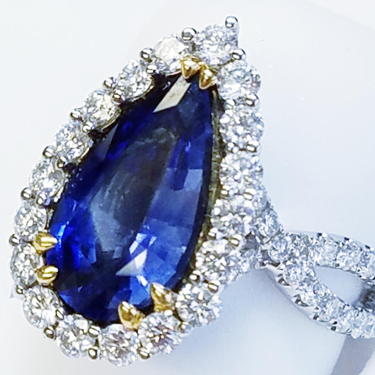 GIA Certified 18 Karat White Gold Pear Cut Blue Sapphire and Diamond Ring In New Condition For Sale In Great Neck, NY
