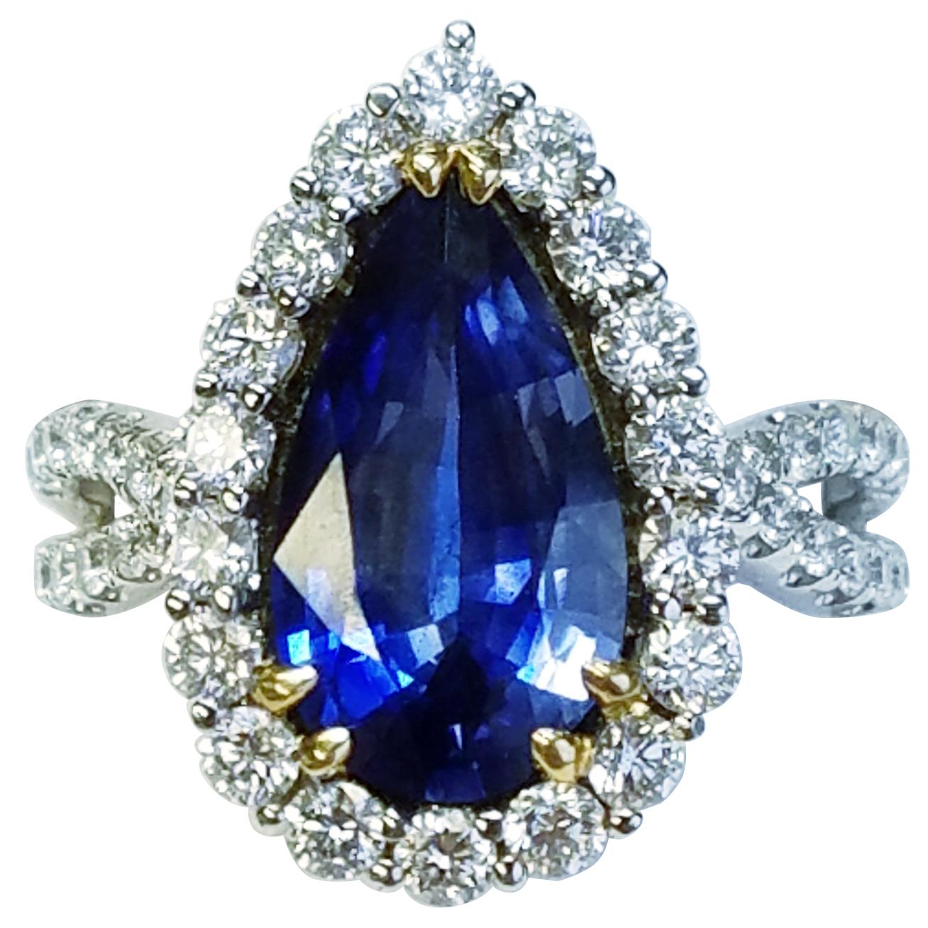 GIA Certified 18 Karat White Gold Pear Cut Blue Sapphire and Diamond Ring For Sale