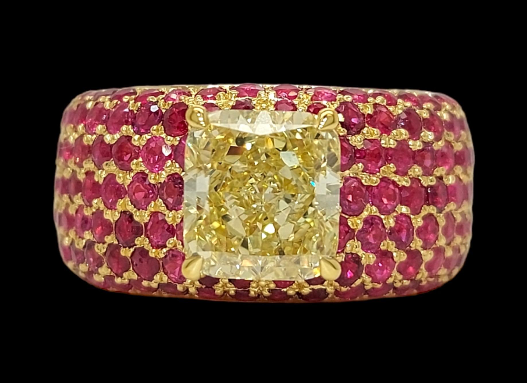 18 Kt. Yellow Gold Ring 3.06 Ct Fancy Yellow Diamond & Ruby

Completely Hand Crafted in Our Atelier, As seen on the last photograph there is also an option of having this ring with red Ceramic coating !

Diamond: Fancy yellow, natural diamond,