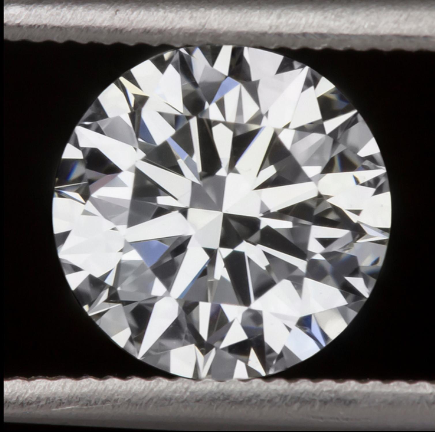 1.80 carat GIA certified Triple EX round brilliant cut diamond is beautifully white, completely eye clean, and impeccably finished! Cut with absolutely ideal proportions, it displays truly phenomenal sparkle! The diamond is certified by GIA, the