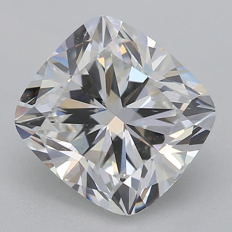 Handcrafted in New York, this stunning diamond ring features a captivating centrally positioned cushion diamond of 1.80 , celebrated for its exquisite clarity at VS2 and elegant hue of G. The captivating stone is embraced by a sophisticated bezel