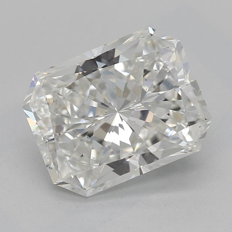Handcrafted in New York, this exquisite diamond ring features a scintillating radiant center stone weighing 1.80 , adorned with a captivating H and SI1 rating, ensuring exceptional brilliance and fire. Set in a luxurious yellow gold band, the ring