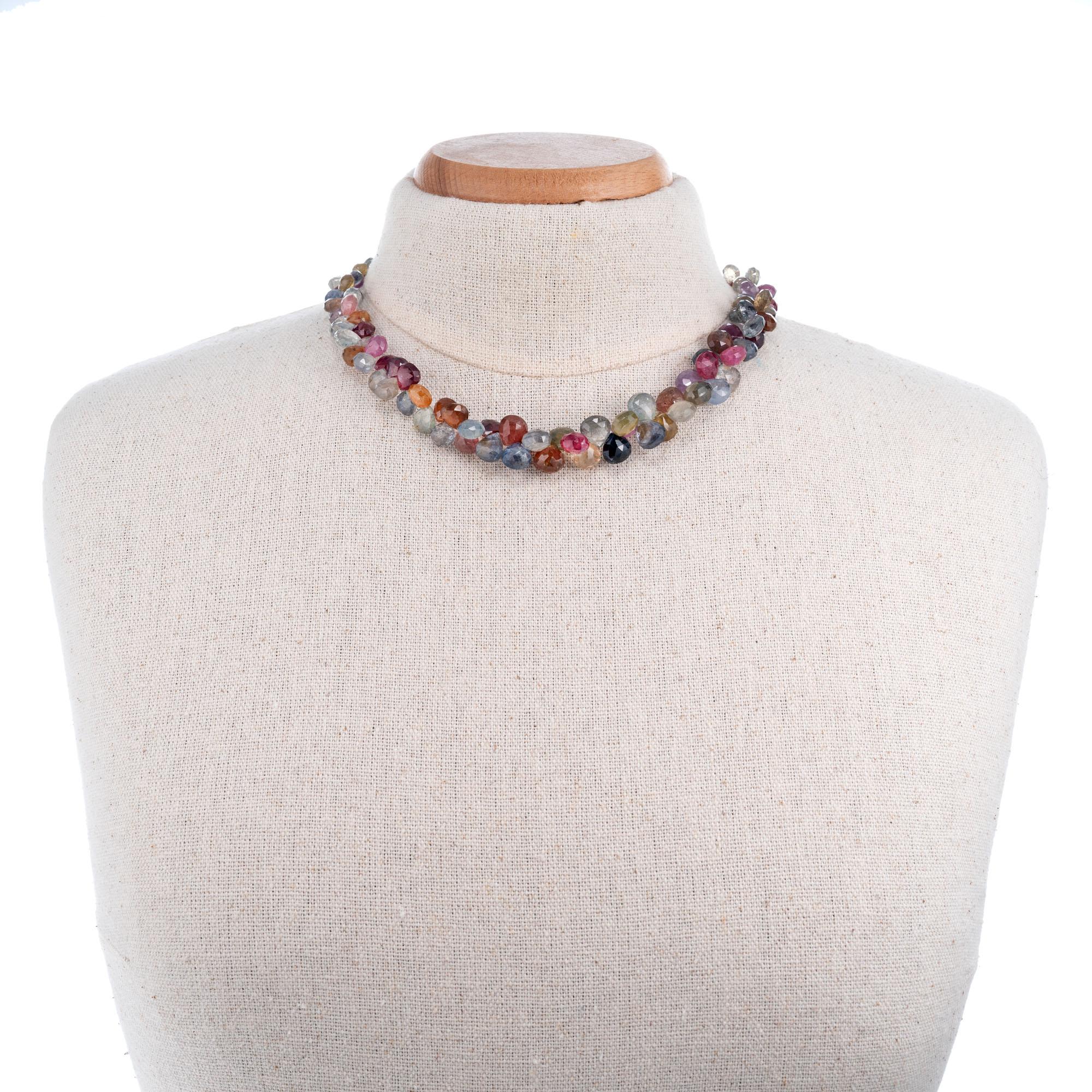 GIA Certified natural multi-color natural untreated graduated sapphire necklace. Secure 18k yellow gold clasp. 

116 pear shaped sapphire beads (pink, red, green, purple red, blue and yellow) approx. 18.0cts GIA Certificate # 2203727552
18k yellow