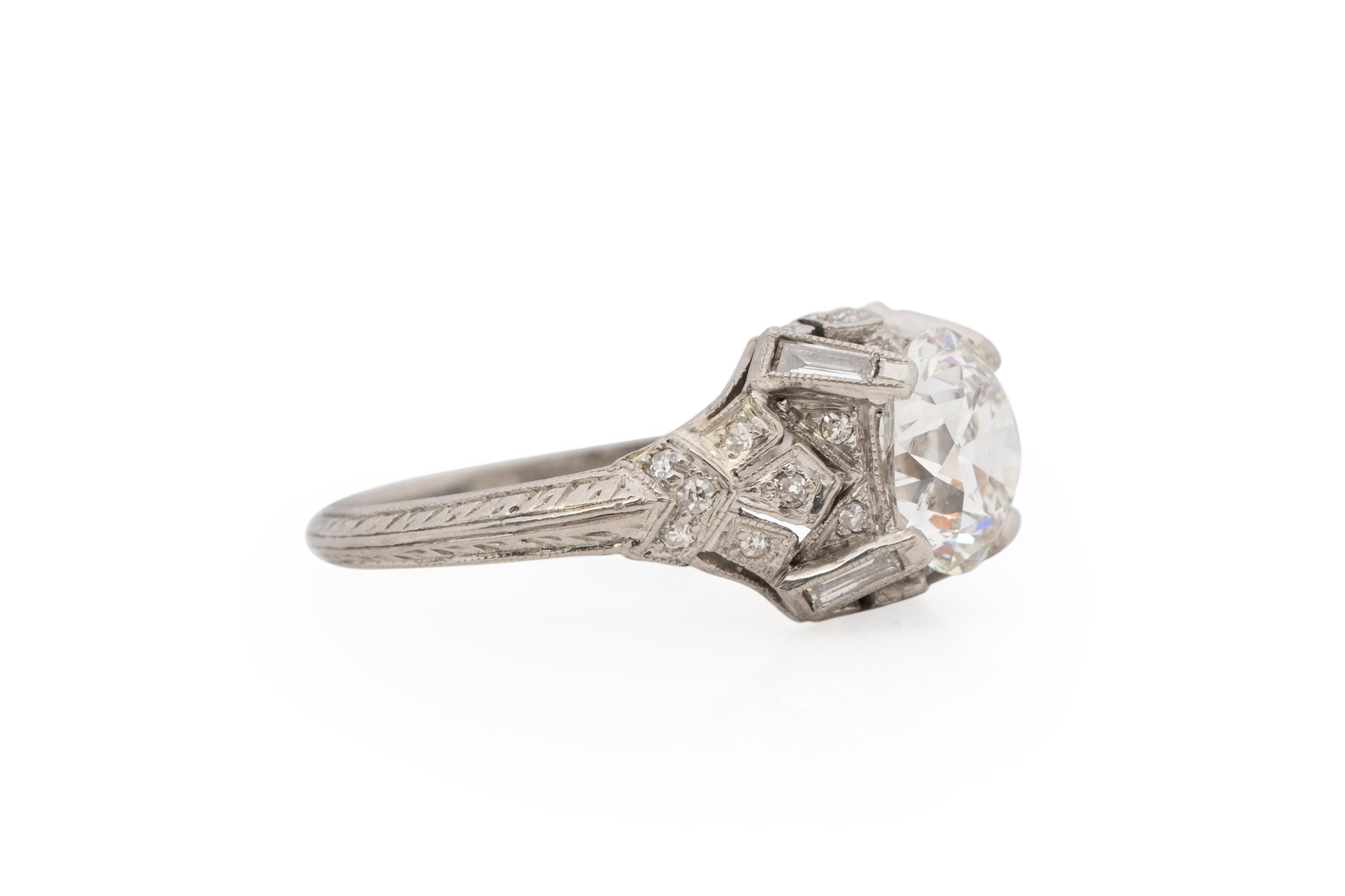 Ring Size: 6.75
Metal Type: Platinum [Hallmarked, and Tested]
Weight: 3.5 grams

Center Diamond Details:
GIA REPORT #: 1216619261
Weight: 1.81 carat 
Cut: Old European brilliant
Color: J
Clarity: SI2
Measurements: 7.90mm x 7.61mm x 4.79mm

Side