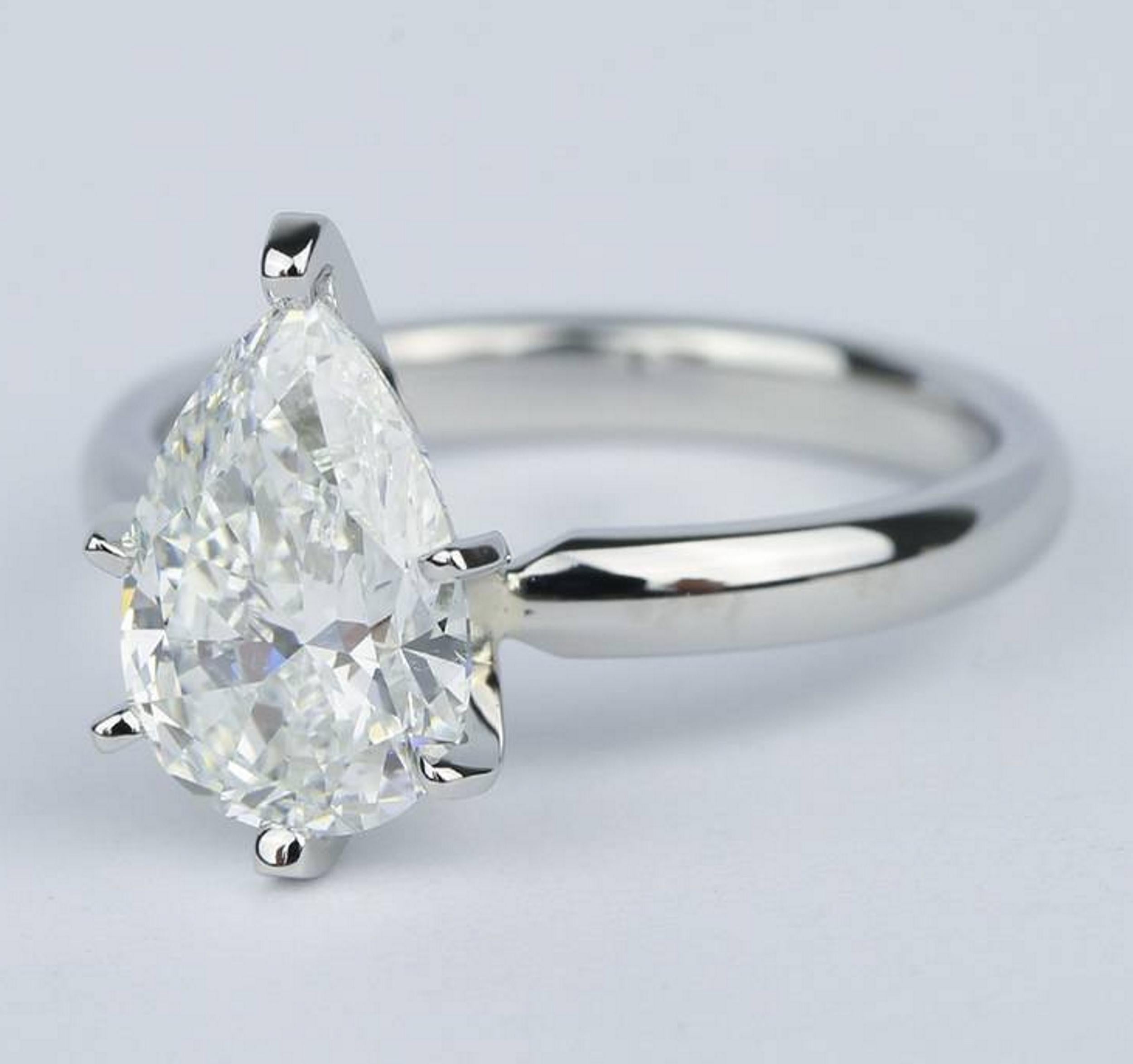 This sizeable 1.50 carat GIA certified pear cut diamond offers vibrant sparkle, a completely eye clean appearance, bright white D color, and a glamorous cut. The diamond is certified by GIA, the world’s premier gemological authority. Graded D for