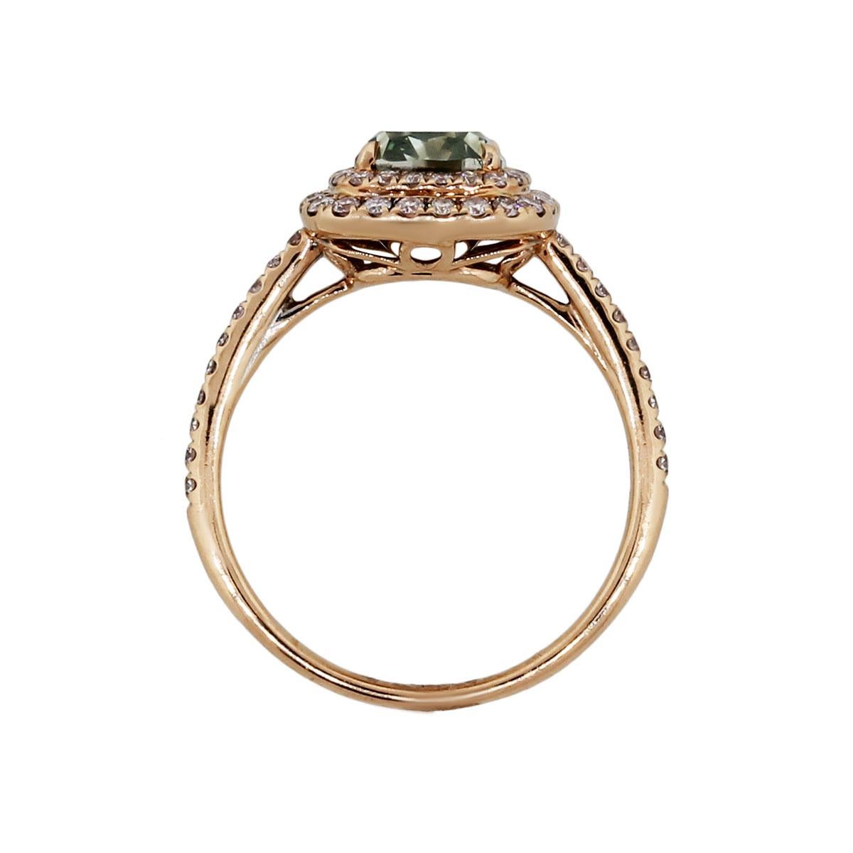 Material: 18k rose gold
Center Diamond Details: GIA certified 1.81ct cushion cut fancy gray-yellowish green diamond, GIA certificate #5172107649.
Additional Diamond Details: Approximately 0.60ctw of round brilliant diamonds.
Ring Size: 6.75 (can be