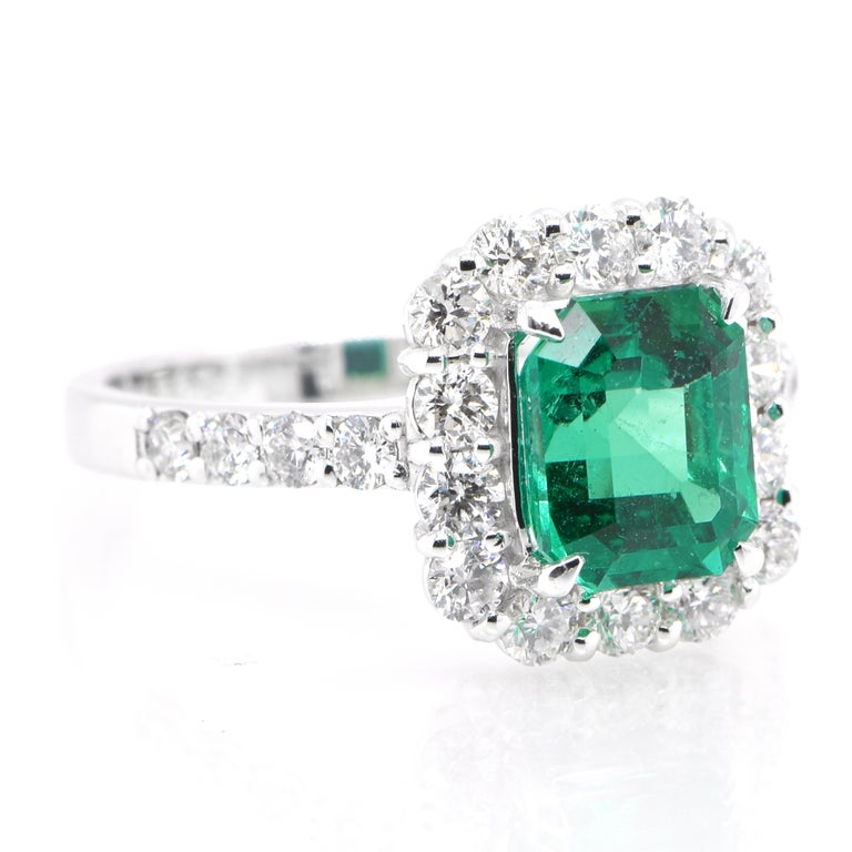 Modern GIA Certified 1.82 Carat Natural Colombian Emerald Ring Set in Platinum For Sale