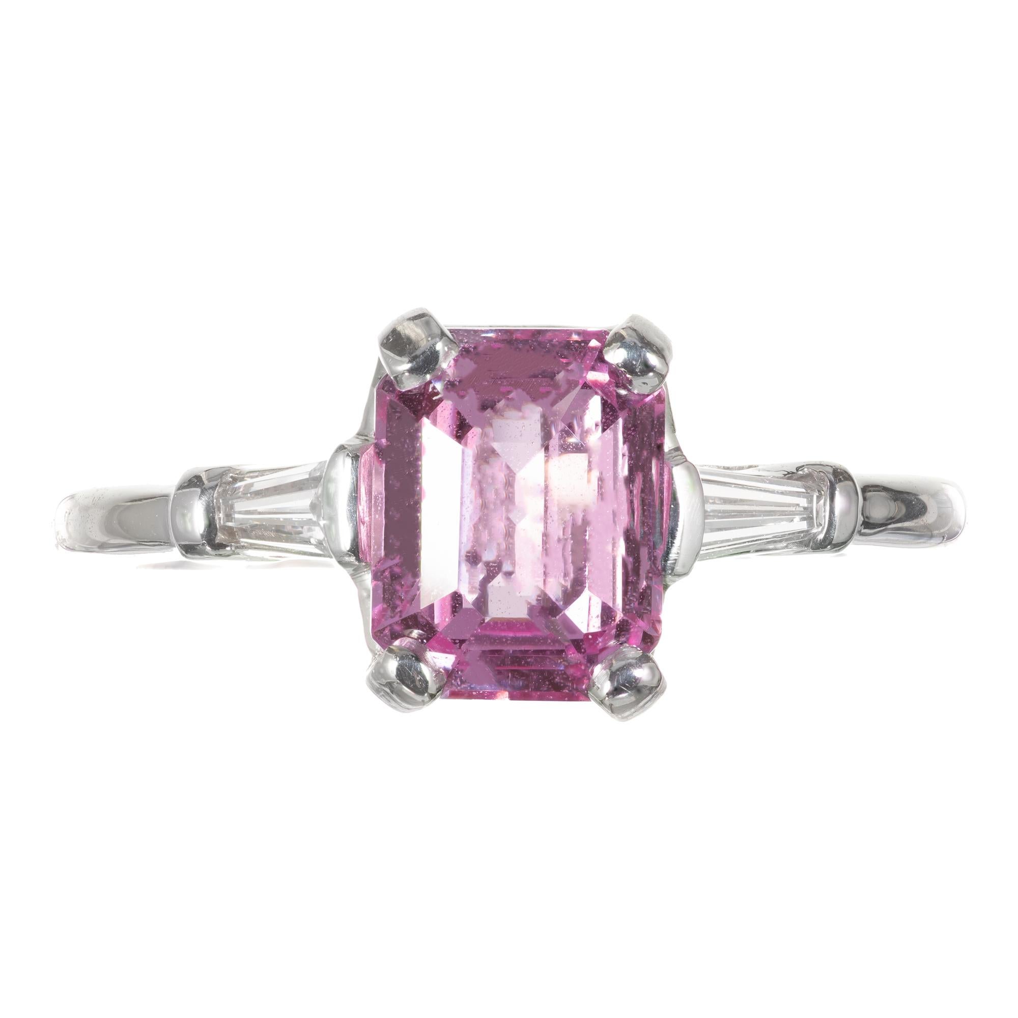 Vintage 1940's sapphire and diamond engagement ring. Pink sapphire center stone with two tapered baguette side diamonds in a platinum three-stone setting. GIA certified pink sapphire natural no heat no enhancements 

1 octagonal pink sapphire,