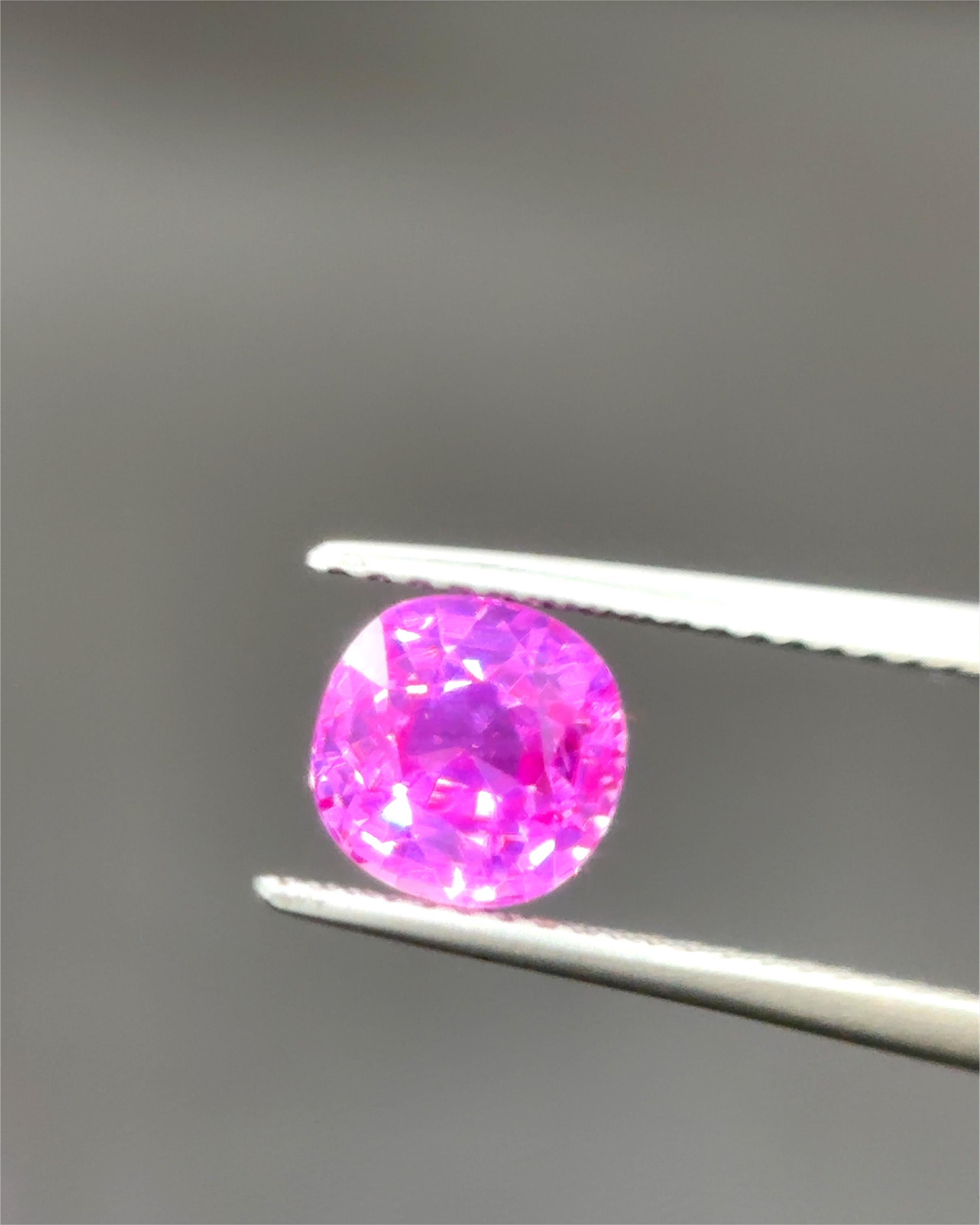 Experience the unmatched beauty and rarity of this 1.83 carat Burma No-Heat Pink Sapphire, sourced directly from the legendary Mogok mines—renowned for producing the world’s finest sapphires. This exquisite gemstone boasts a rich vivid pink hue,