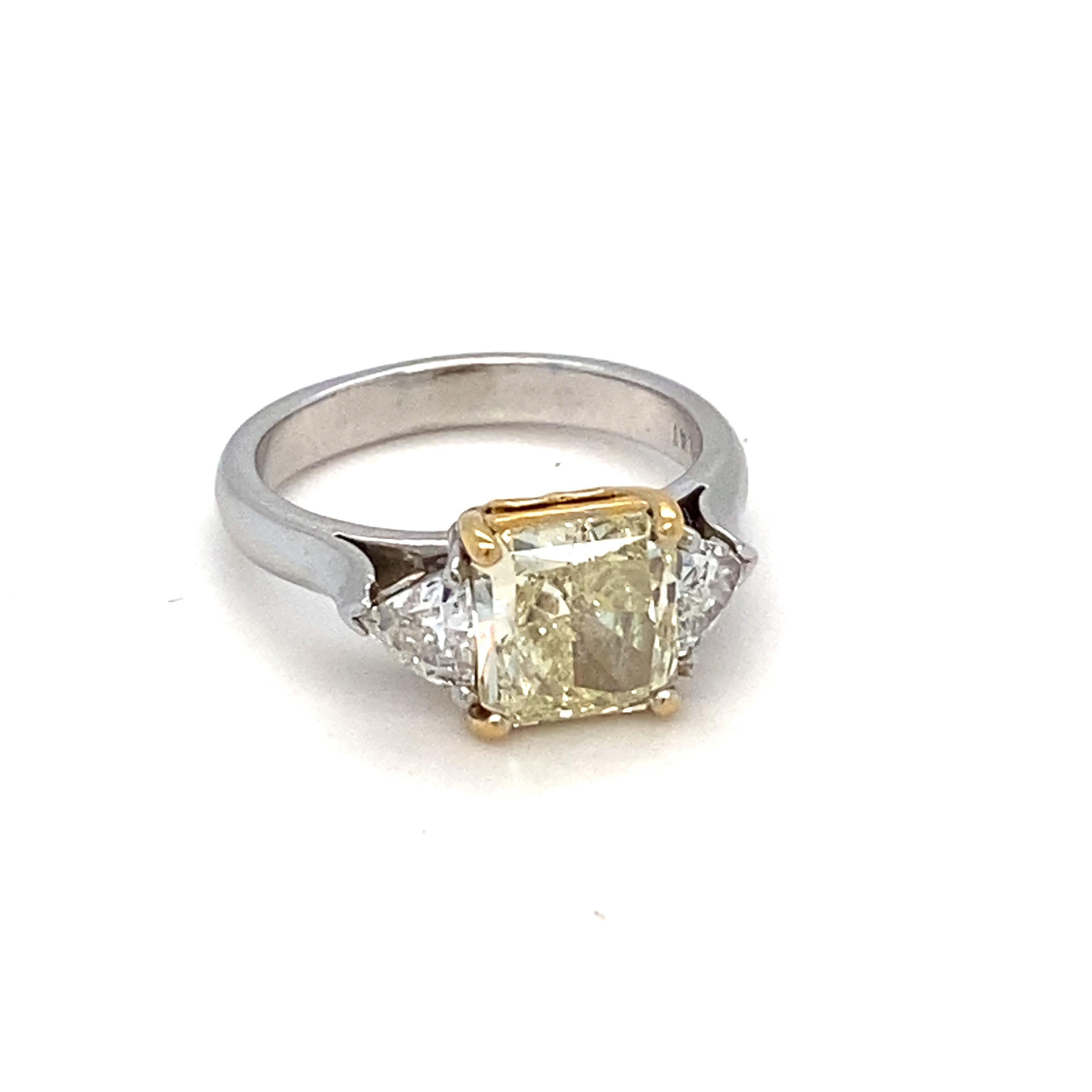 GIA Certified 1.83 Carat Natural Fancy Light Yellow Diamond Engagement Ring For Sale 12