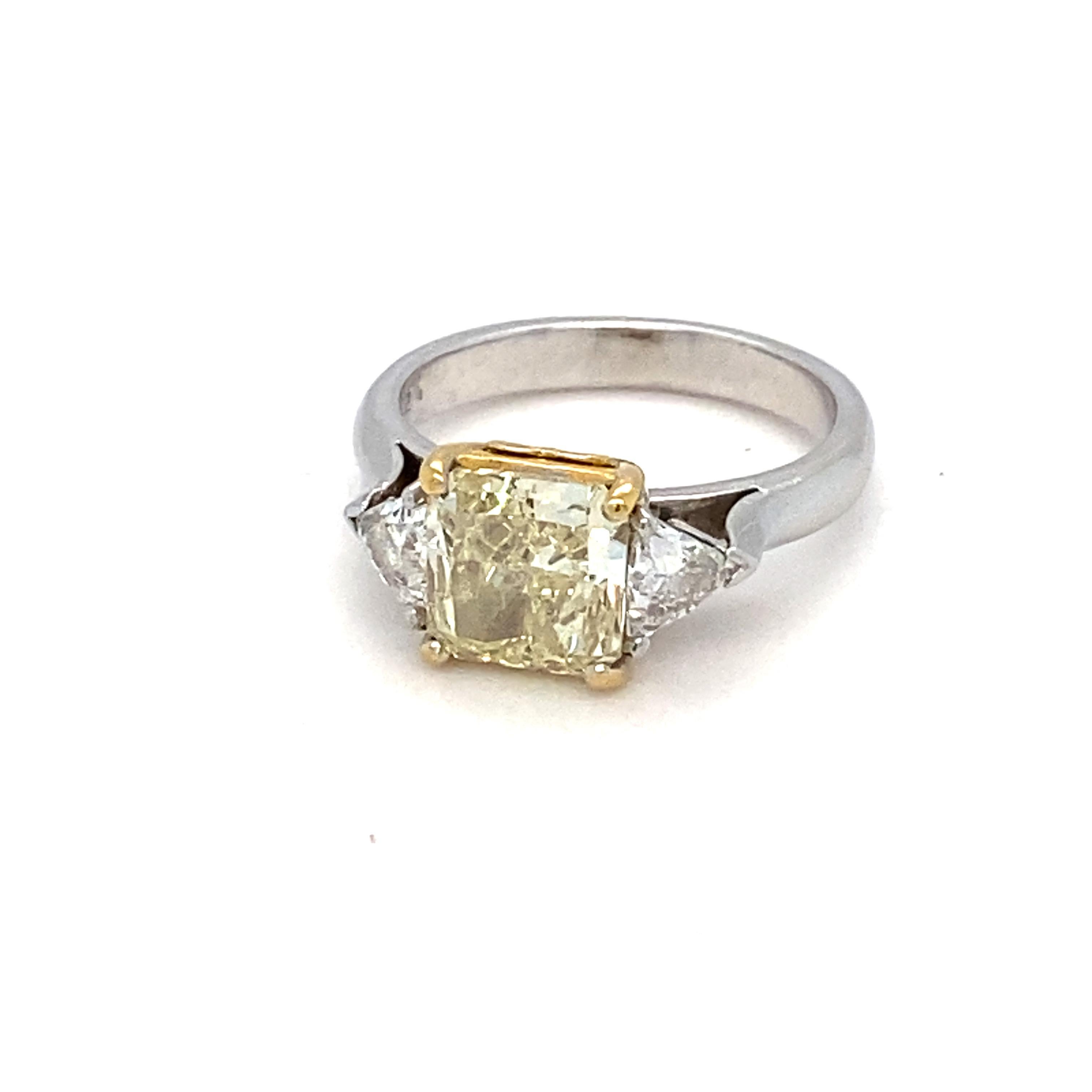 Contemporary GIA Certified 1.83 Carat Natural Fancy Light Yellow Diamond Engagement Ring For Sale