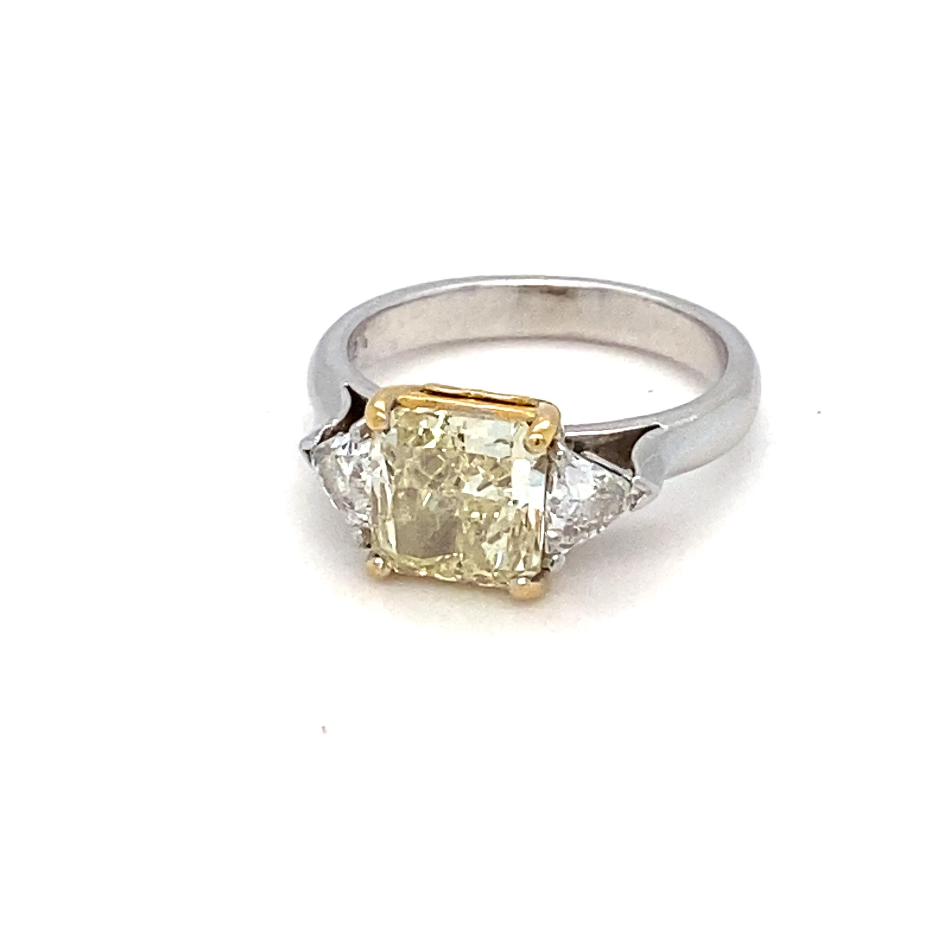 Contemporary GIA Certified 1.83 Carat Natural Fancy Light Yellow Diamond Engagement Ring
