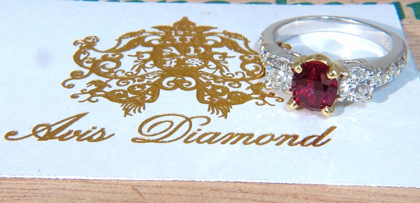 GIA Certified 1.83ct oval cut pigeons blood red ruby 1.02ct diamonds ring 18kt In New Condition In New York, NY