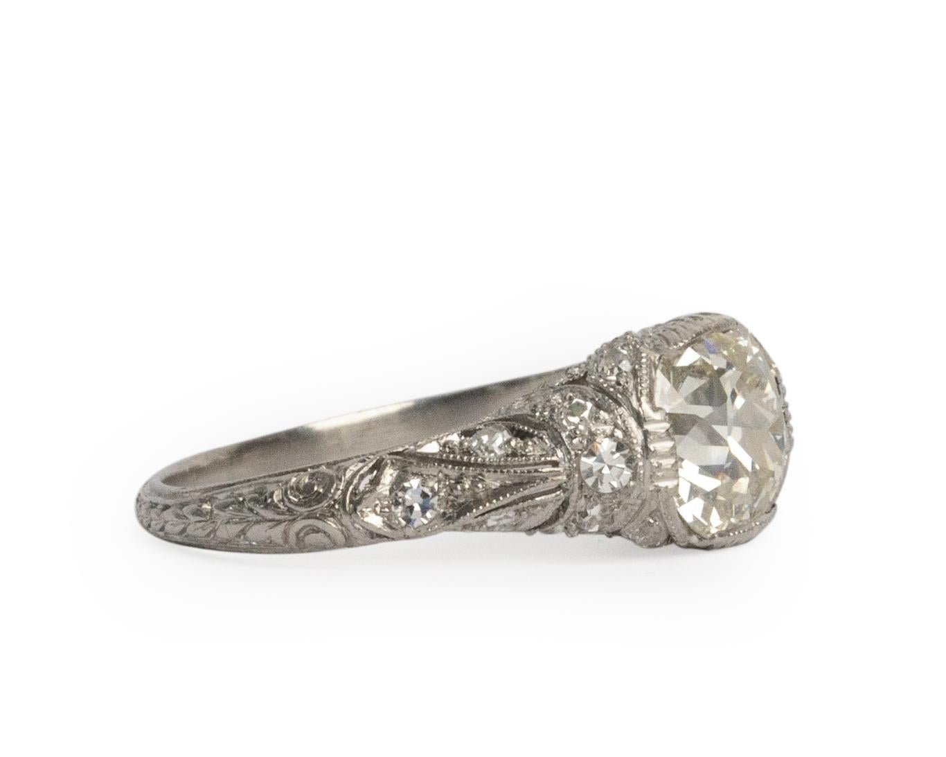 Ring Size: 7
Metal Type: Platinum  [Hallmarked, and Tested]
Weight:  3.5 grams

Center Diamond Details:
GIA REPORT #: 2211093523
Weight: 1.84
Cut: Old Mine - Antique Cushion
Color: M
Clarity: VS2

Side Diamond Details:
Weight: .25 carat, total