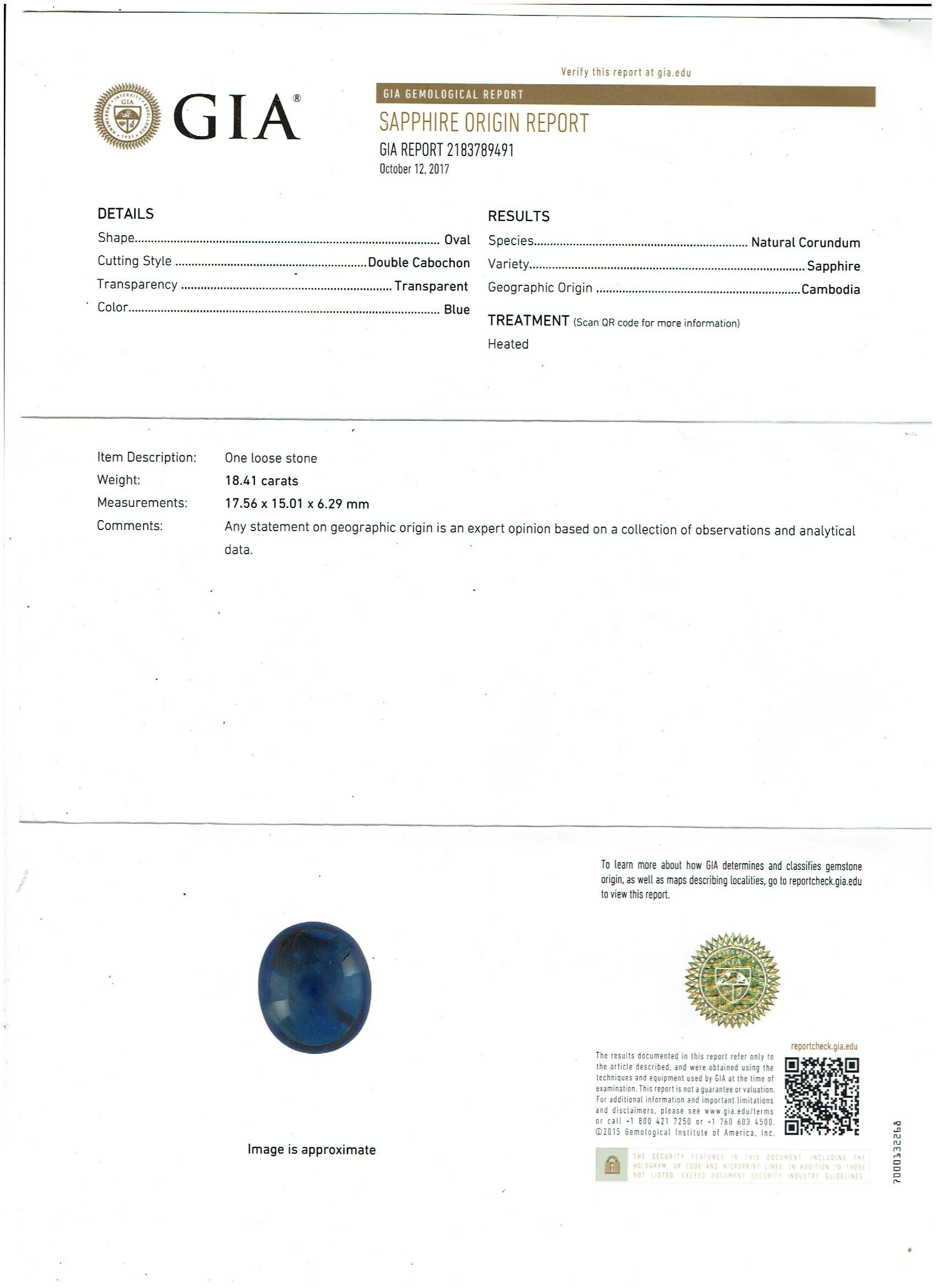  GIA Certified 18.41 Ct Sapphire & 21 Ct Diamond VVS/E-F Color  Pin Set in 18 Karat white gold 
Sapphire Cabochon 18.41 ct 
GIA Report # 2183789491
Natural Corundum 
Variety Sapphire 
Origin Cambodia
Measurement 17.56 x 15.01 x 6.29  
18 K gold 40