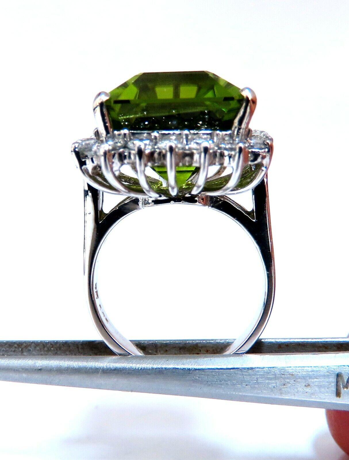Emerald Cut Peridot Classic 

GIA Certified 18.53ct. Natural Peridot ring.

Emerald cut, clean clarity & Transparent.

Classic Green Color

17.03 X 13.00 X 10.45mm

Report #2171291318



1.20ct  Side natural round diamonds 

Full cut