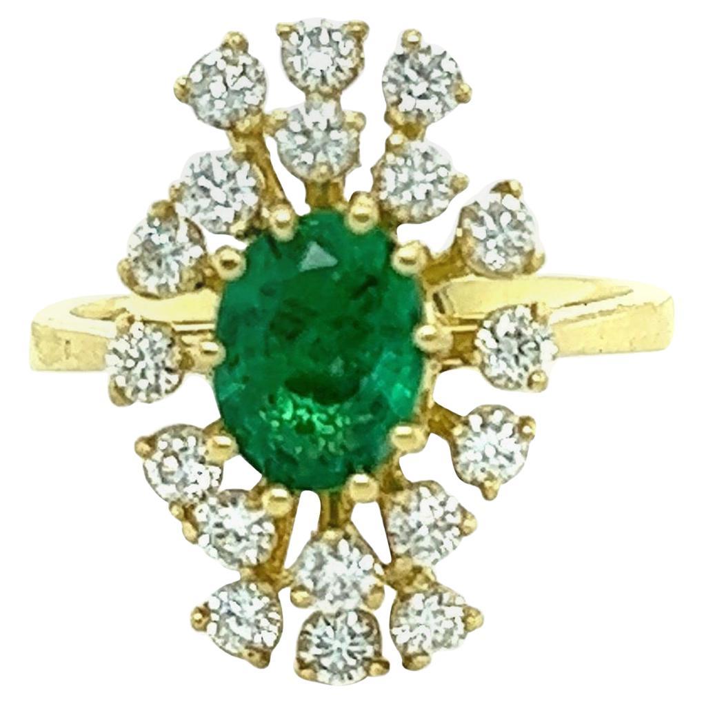 GIA Certified 1.87 Carat Natural Emerald Diamond Yellow Gold Ring

This ring has a 1.03 Carat Oval Cut Emerald and is surrounded by Natural Round Cut Diamonds that weighs 0.84 Carats. (Clarity: SI1, Color: F) The total carat weight of the ring is