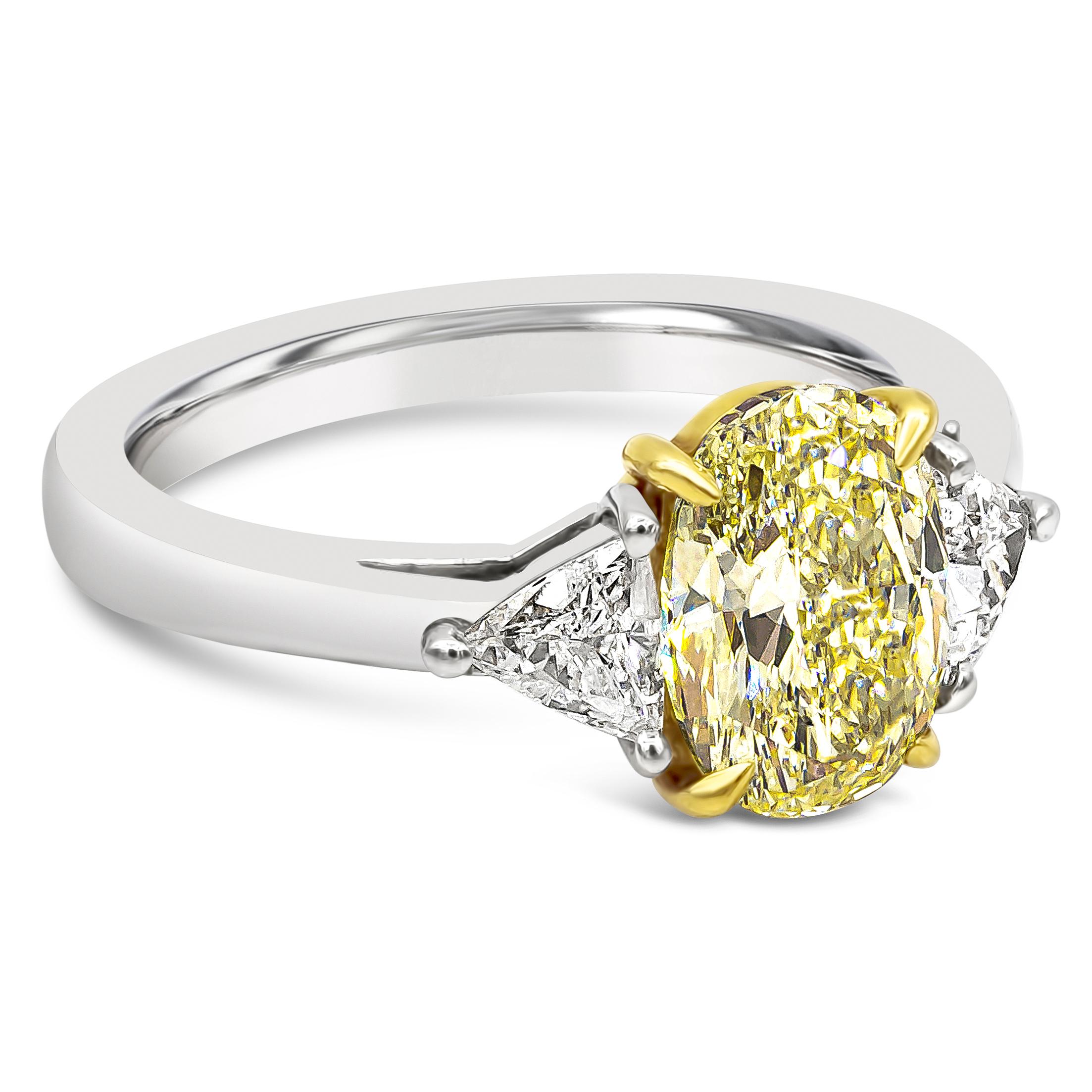 For Sale:  GIA Certified 1.87 Carats Oval Cut Yellow Diamond Three-Stone Engagement Ring 2
