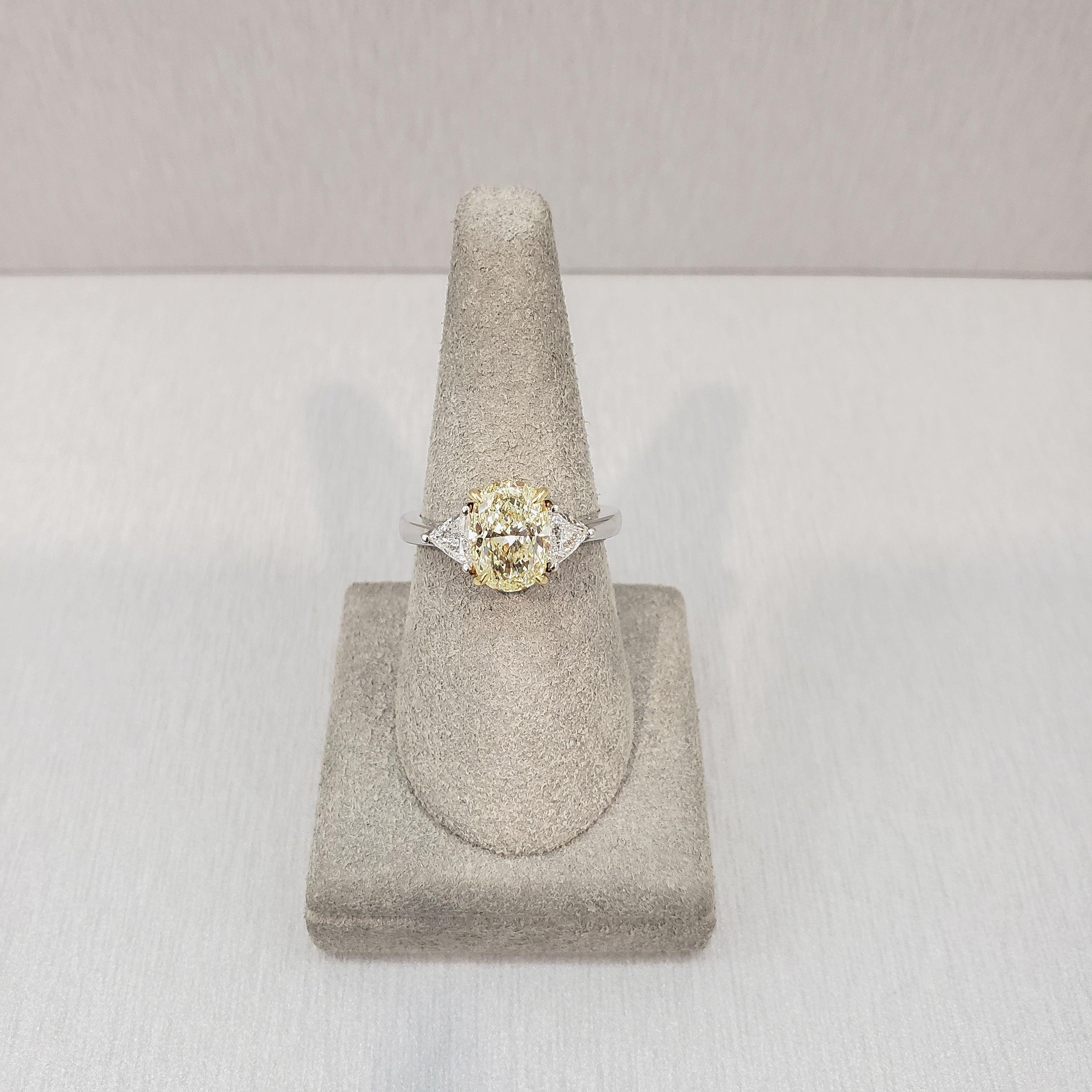For Sale:  GIA Certified 1.87 Carat Oval Yellow Diamond Three-Stone Engagement Ring 4