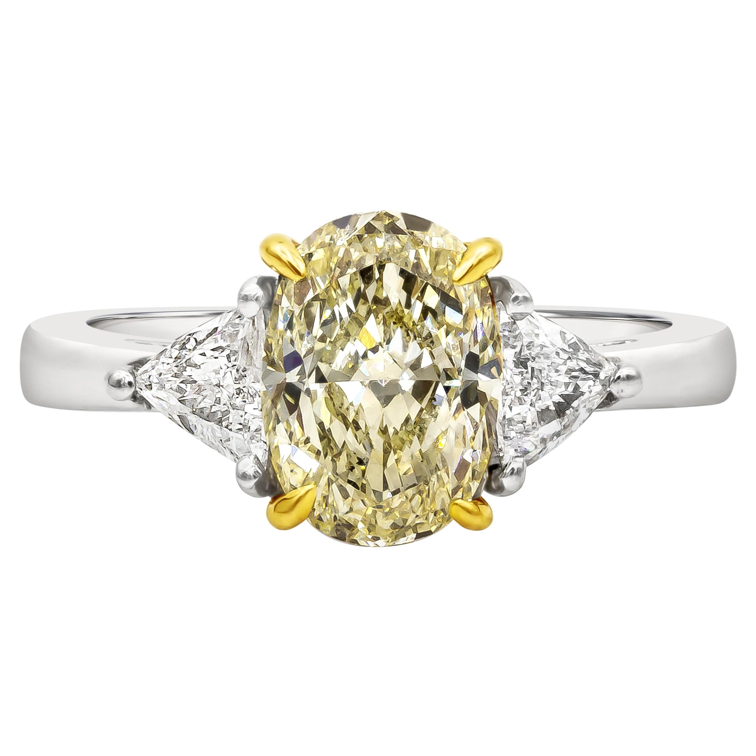 GIA Certified 1.87 Carat Oval Yellow Diamond Three-Stone Engagement Ring For Sale