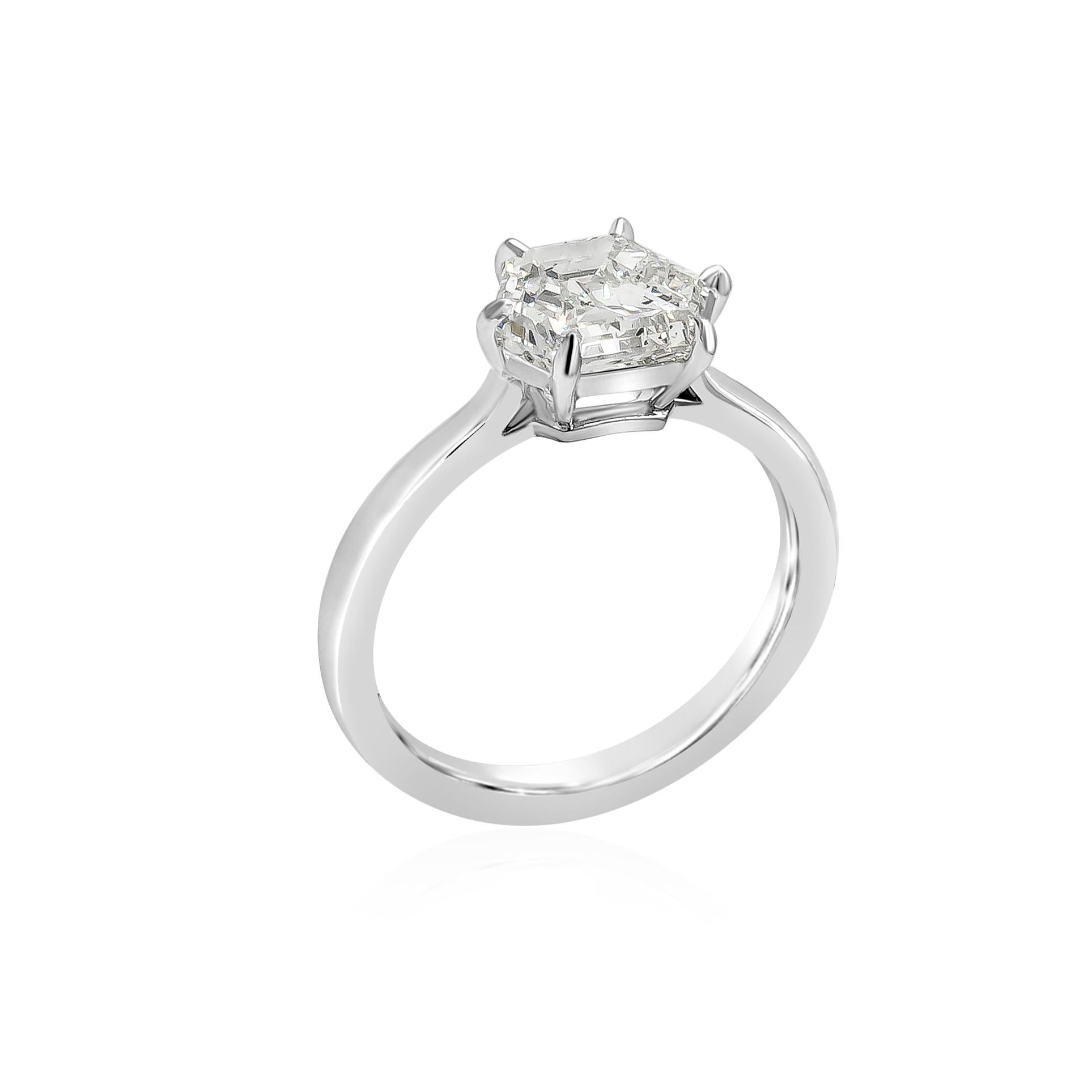 A well crafted engagement ring showcasing a 1.87 carats trapezoid diamond, set in a classic thin platinum mounting. GIA certified the diamond as K color, SI2 in clarity. Size 6.25 US, resizable upon request.

Style available in different price