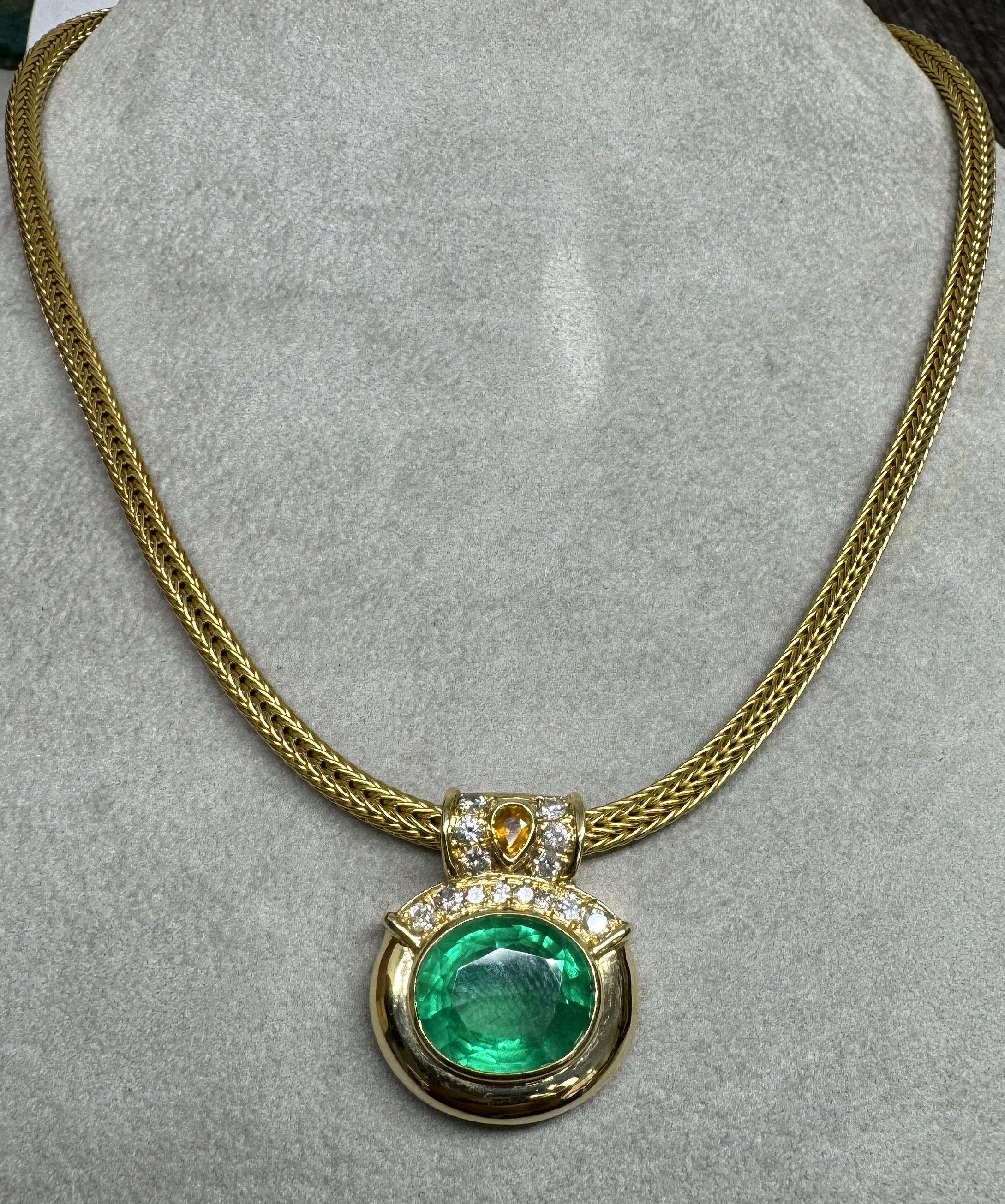 GIA Certified 18.80cts. Oval Emerald and Diamond Pendant set in 18k Yellow Gold
Specifications:
Metal: 18K yellow gold
Weight: 46.92 Gr
Main Stone: GIA Certified 18.80cts. (Estimated
                      weight) Oval Emerald 15.70 x 13.10 x