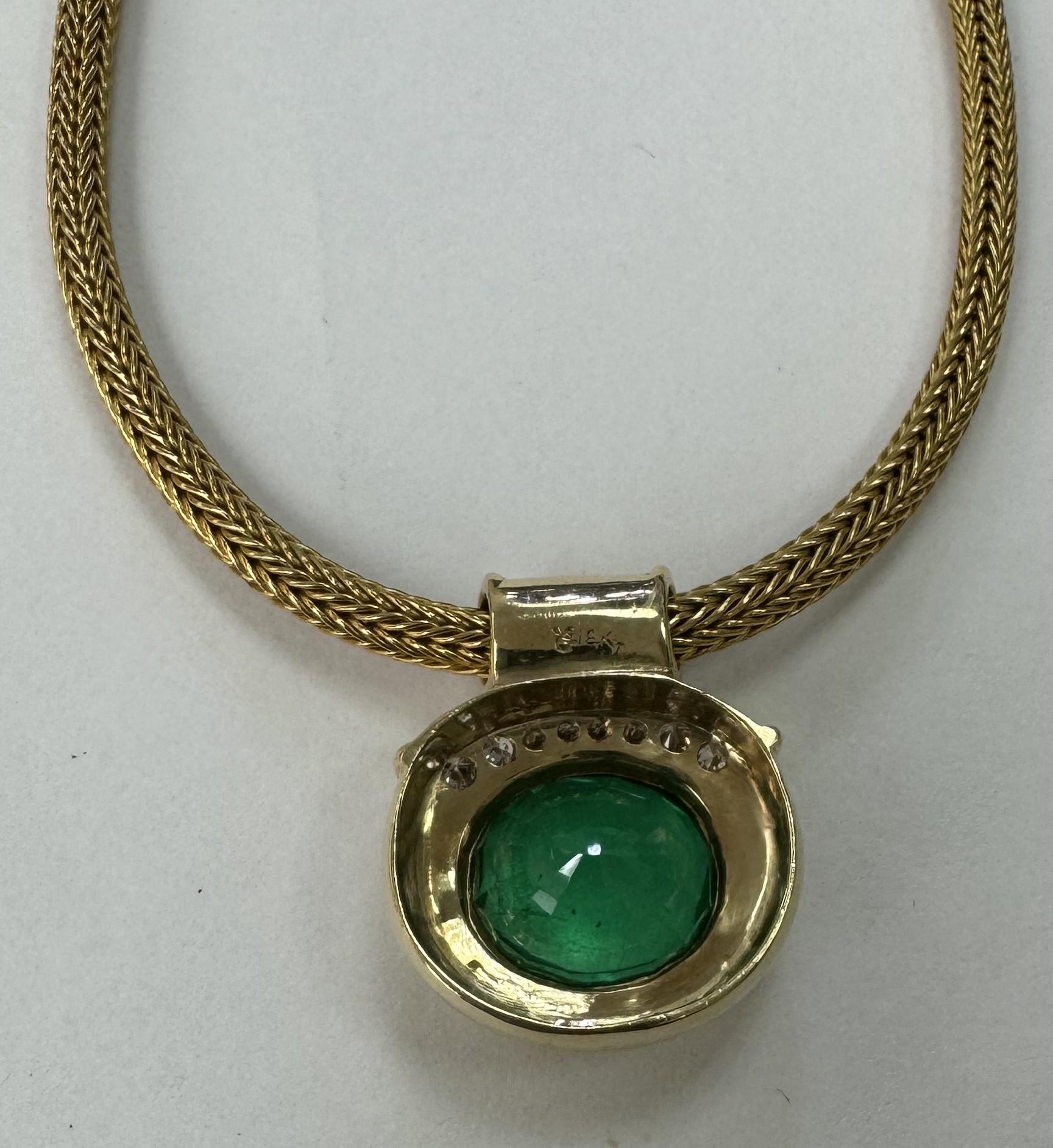 Contemporary GIA Certified 18.80cts. Oval Emerald and Diamond Pendant set in 18k Yellow Gold For Sale