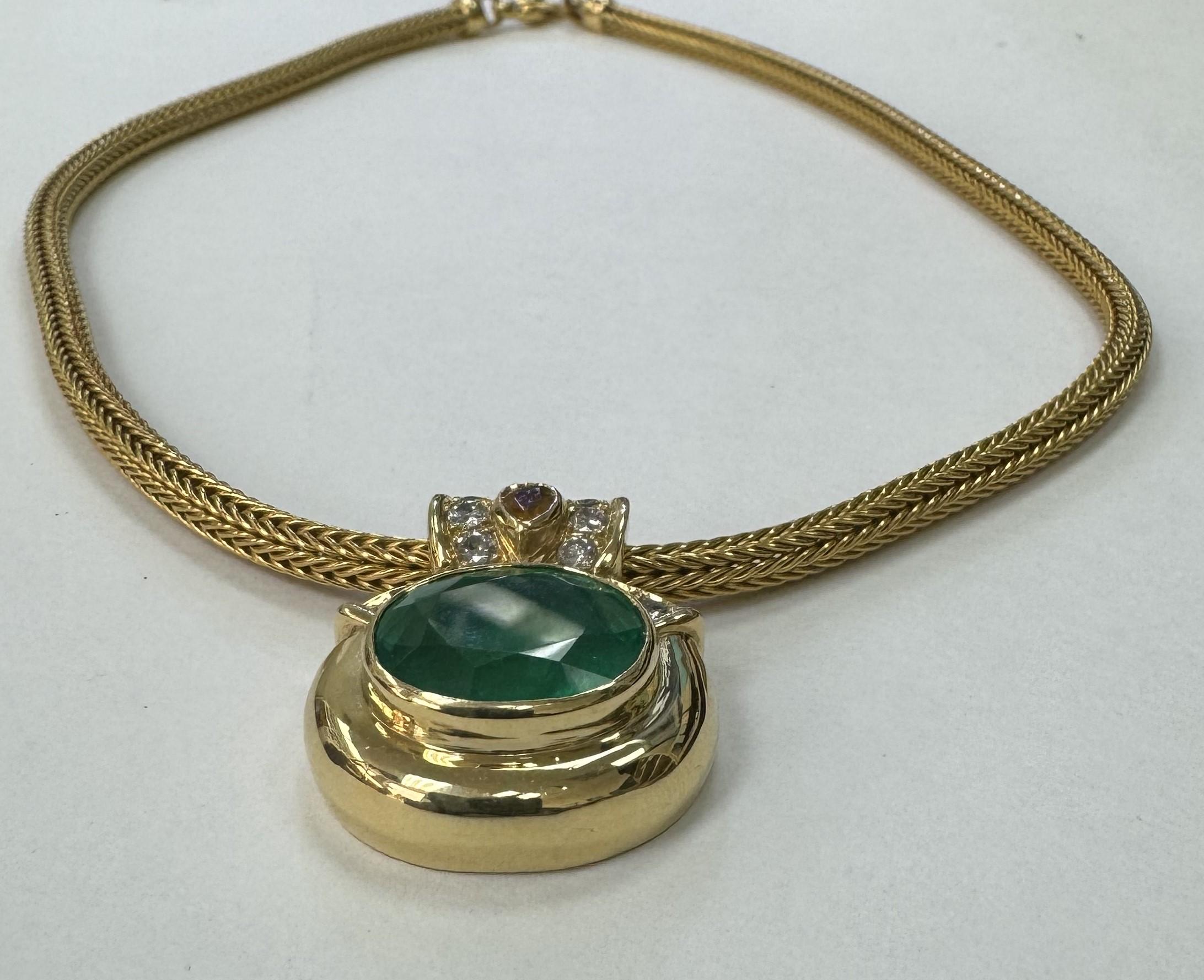 GIA Certified 18.80cts. Oval Emerald and Diamond Pendant set in 18k Yellow Gold In Excellent Condition For Sale In Los Angeles, CA