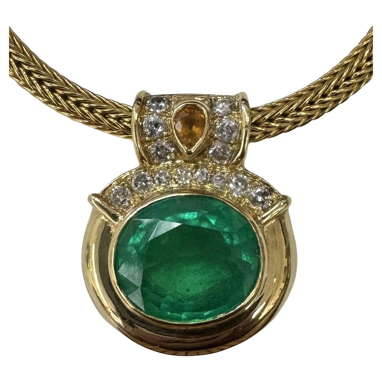 GIA Certified 18.80cts. Oval Emerald and Diamond Pendant set in 18k Yellow Gold For Sale