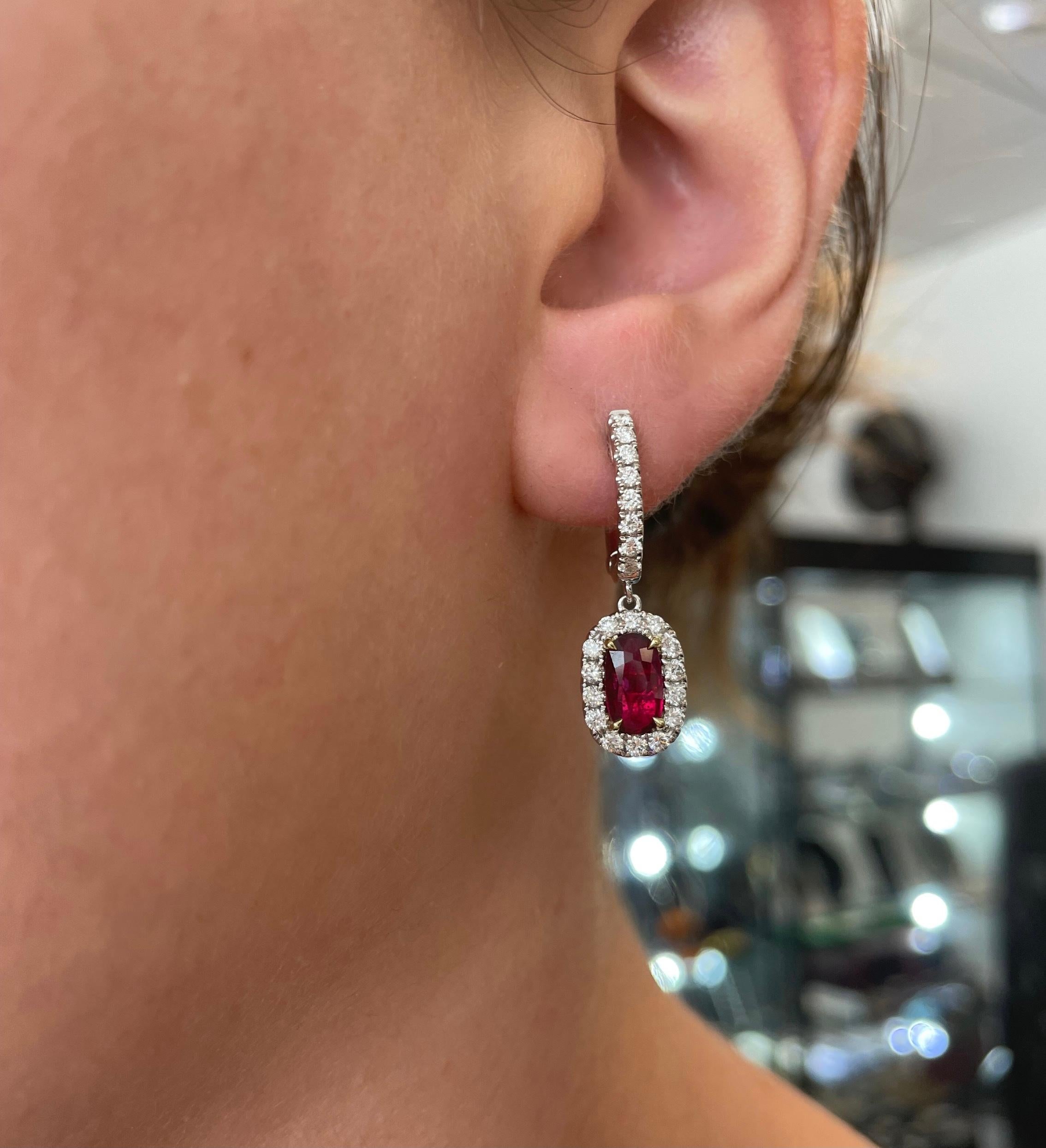 Sensational ruby and diamond drop earrings. Very clean rubies with superb color and no treatment. Created by Alexander of Beverly Hills.
2 GIA certified oval rubies, 1.89 carats total, no heat treatment. Complimented by 44 round brilliant diamonds,