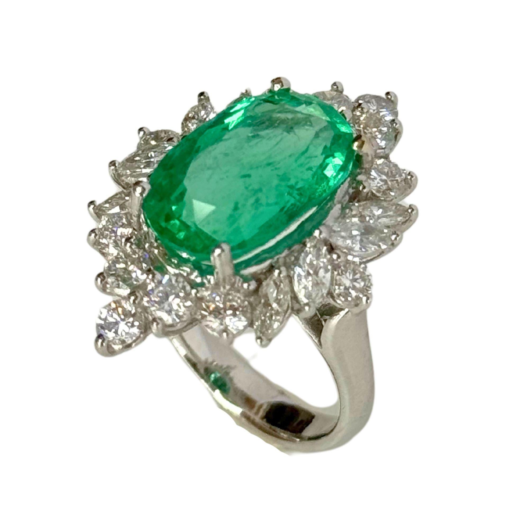 Elevate your style with our stunning GIA Certified 18k Diamond and Emerald Ring. Crafted in 18k white gold with a total weight of 8.59 grams, this ring boasts a sparkling 1.93 carat diamond and a stunning 5.68 carat Columbian emerald in the center.