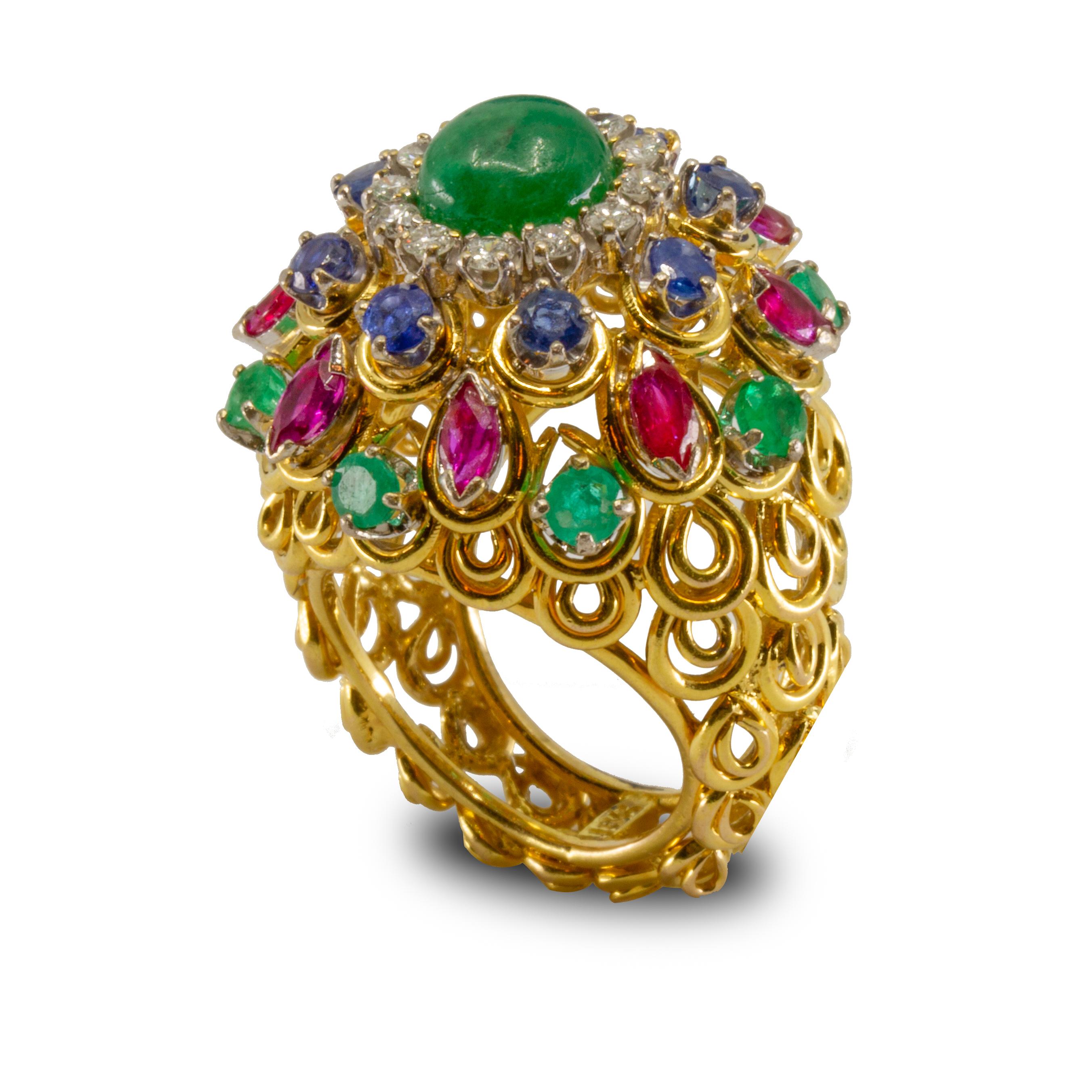 Offered is a beautiful and colorful 18K Gold Diamond, Ruby, Emerald and Sapphire bombe statement ring Circa 1970's Size 4 Accompanied with a GIA appraiser letter. 