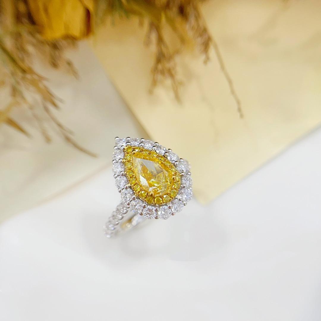 Pear Cut GIA Certified 18K White Gold Pear-cut Yellow Diamond Ring For Sale