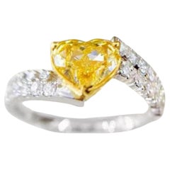 GIA Certified 1.04 Carat Heart Shaped Yellow Diamond Twisted Shank Ring