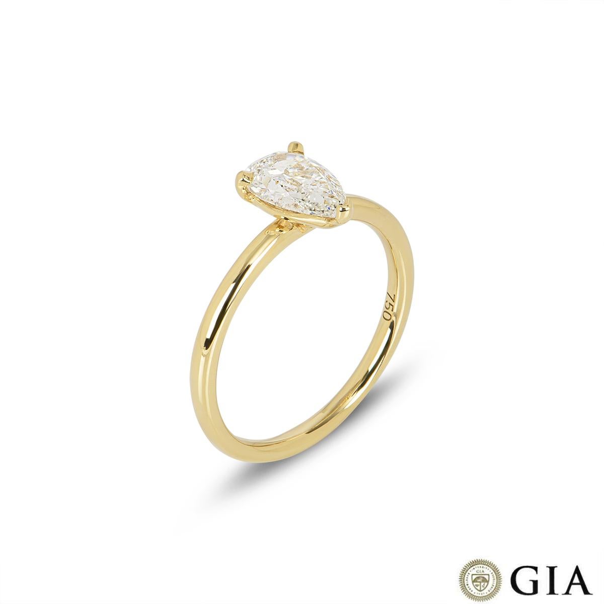 A stunning 18k yellow gold diamond engagement ring. The solitaire ring features a pear cut diamond set to the centre in a three claw mount weighing 1.00ct, G colour and SI1 clarity. The ring measures 1.90mm wide, has a gross weight of 2.69 grams and