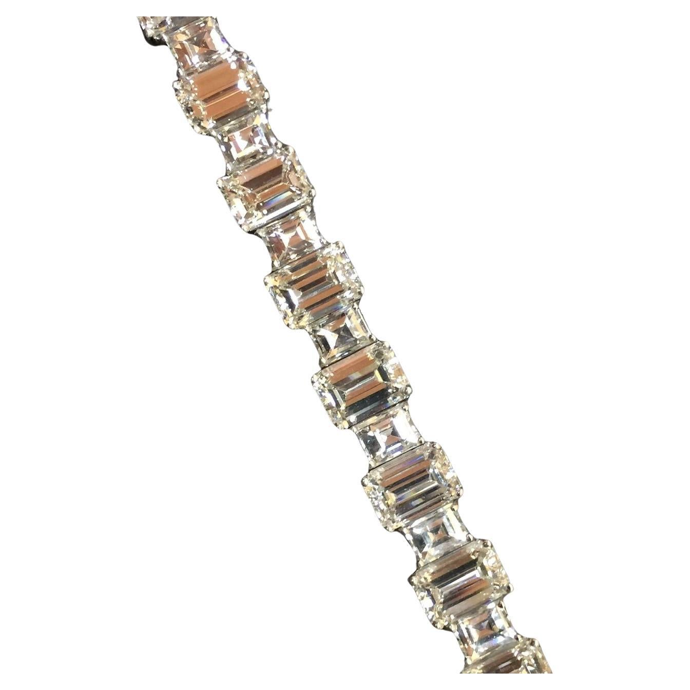 Modern GIA Certified 19 Carat Emerald Cut Diamond Platinum Bracelet For Sale