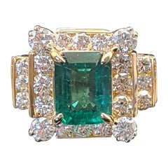 GIA Certified 1.90 Carat Emerald and Diamond Ring with a 14k Gold Mount Setting