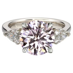 Anello in platino con diamante rotondo taglio brillante certificato GIA da 1,26 carati rosa chiaro