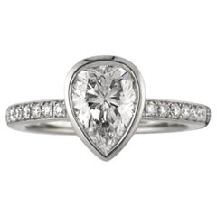 GIA Certified 1.90 Carats E VVS1 Pear Diamond Bezel Pavé Ring in 18K White Gold